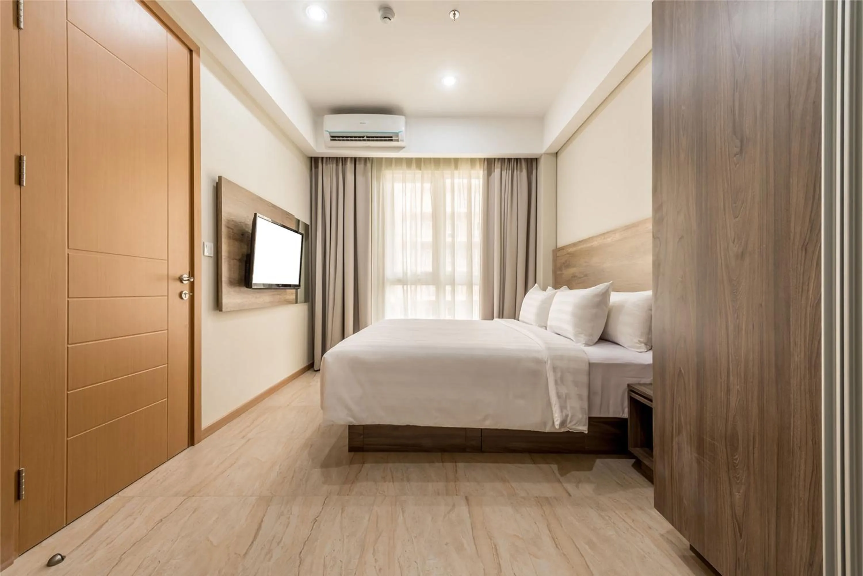 Bed in Grande Valore Hotel Cikarang