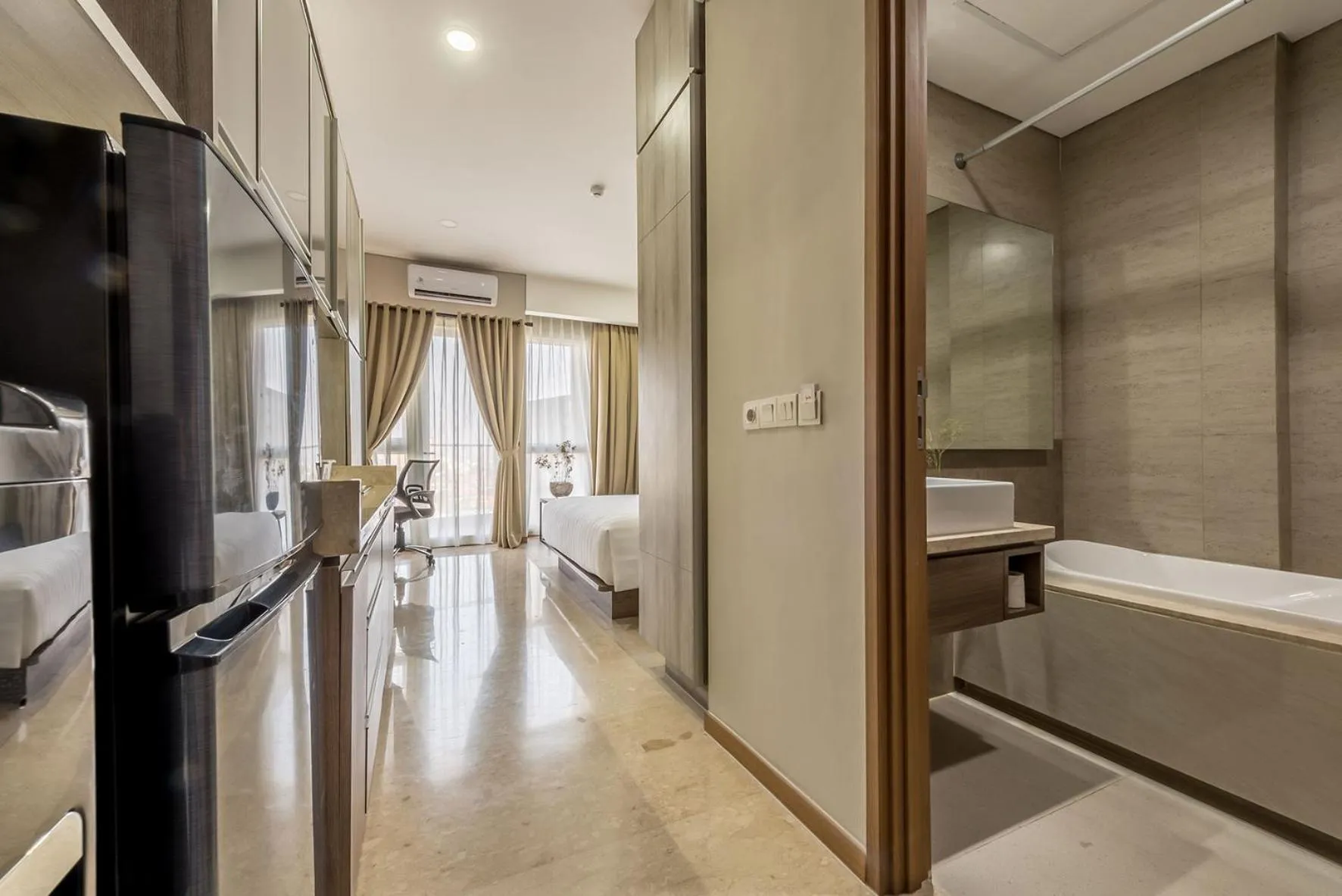 Bathroom, Bed in Grande Valore Hotel Cikarang