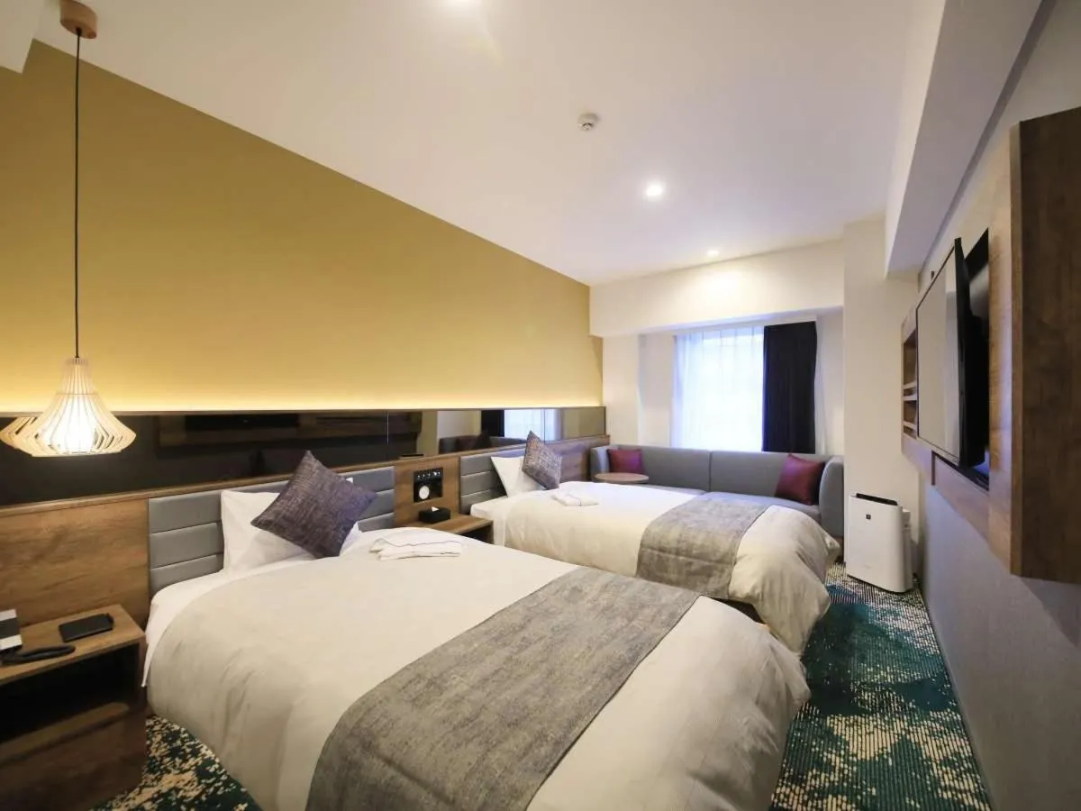 Bed in Quintessa Hotel Fukuoka Tenjin Minami