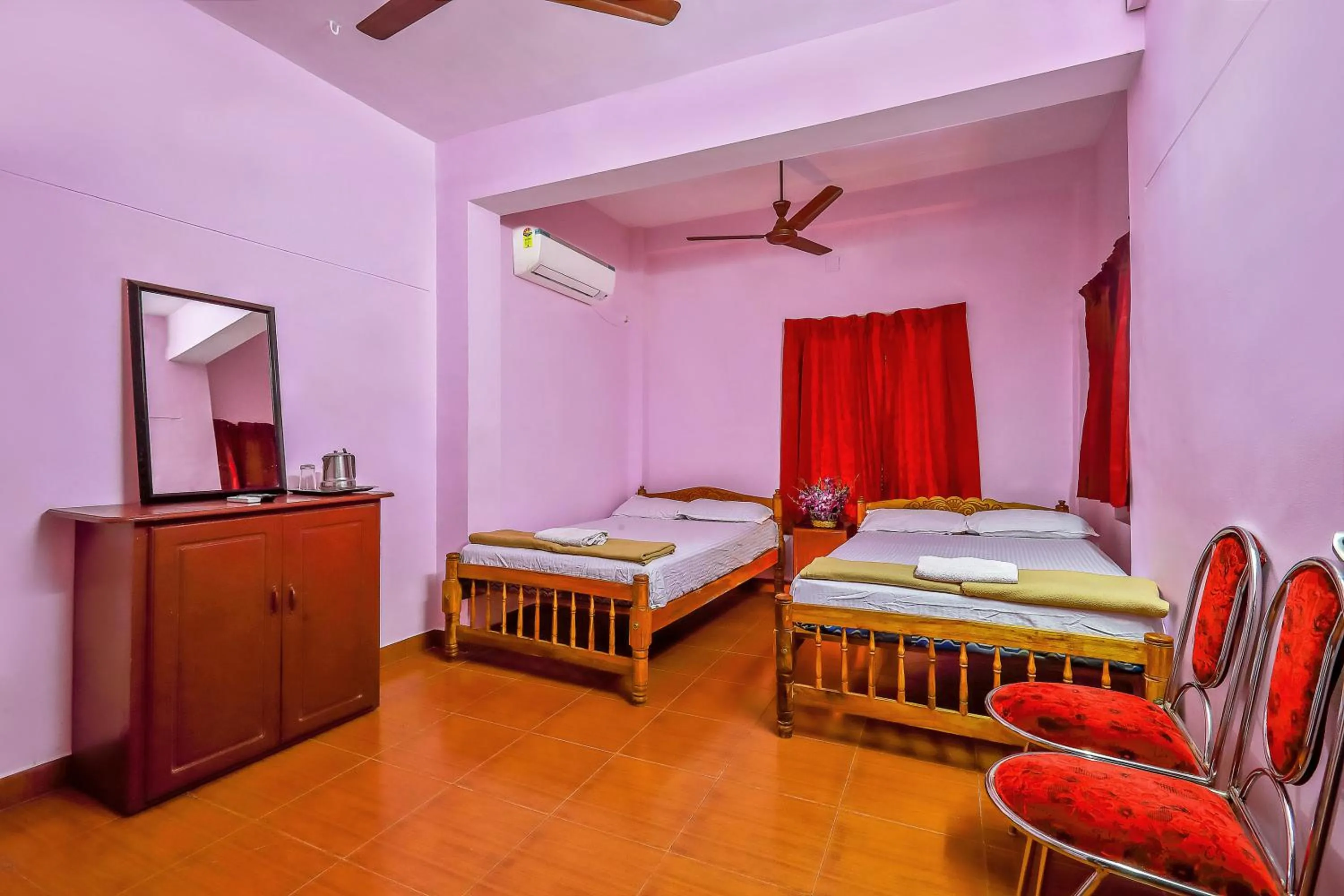 Bed in Sri Udupi Hotel