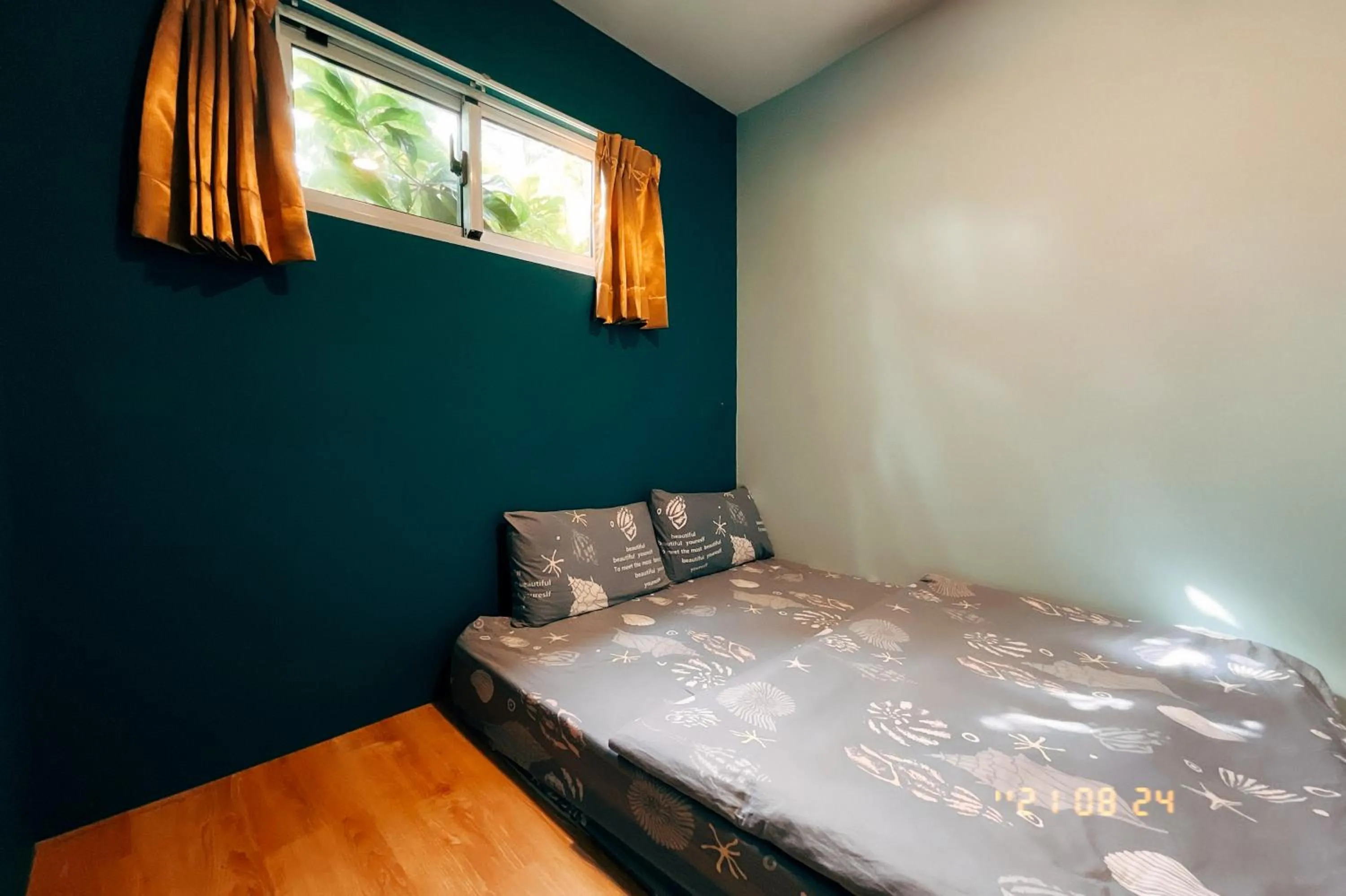 Bed in Little Ryukyu Hermit Crab Homestay