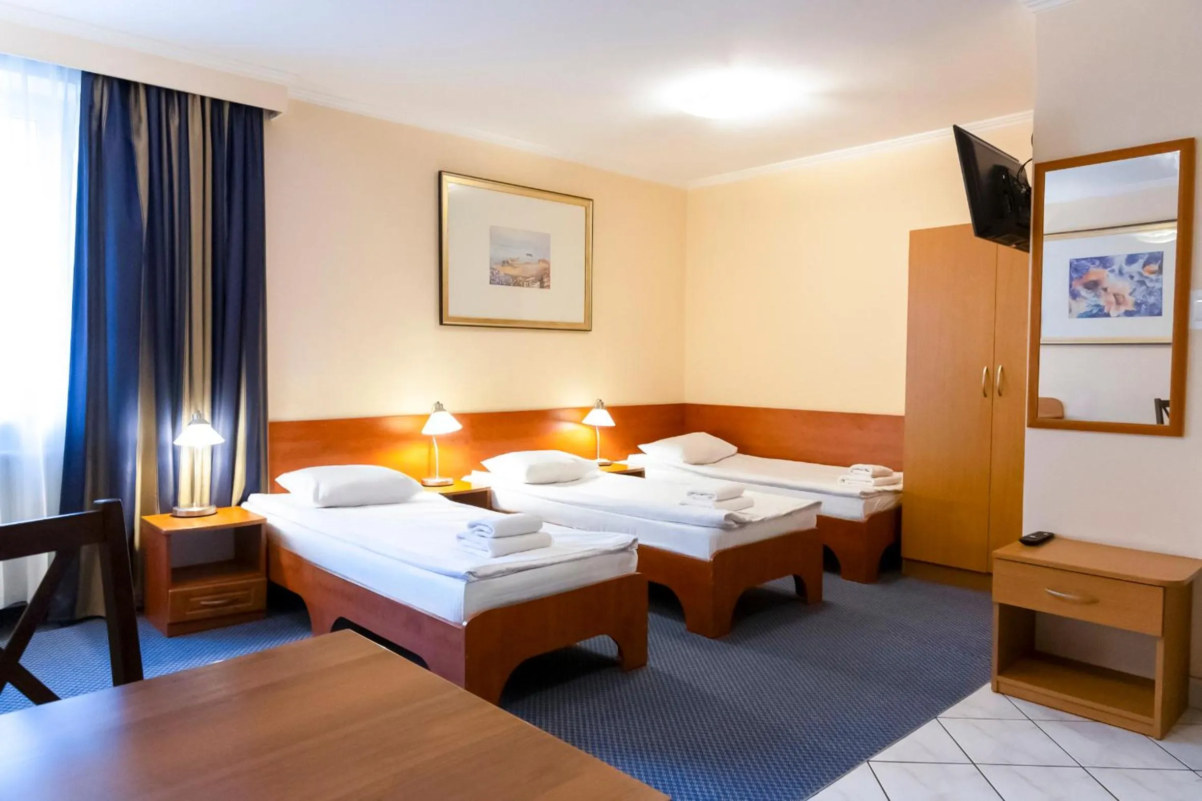 Bed in Noclegi Hit Rooms & Apartments