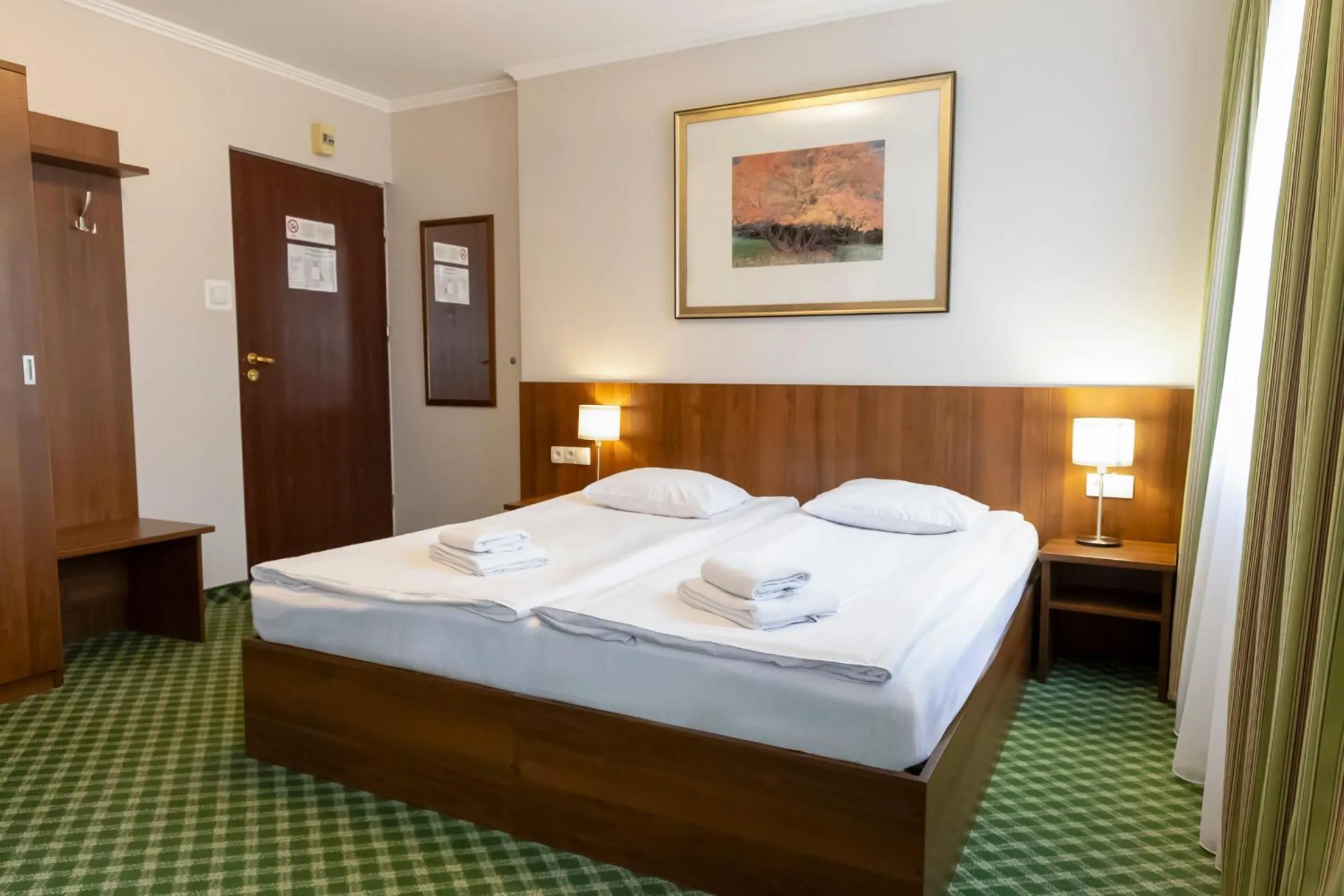 Bed in Noclegi Hit Rooms & Apartments