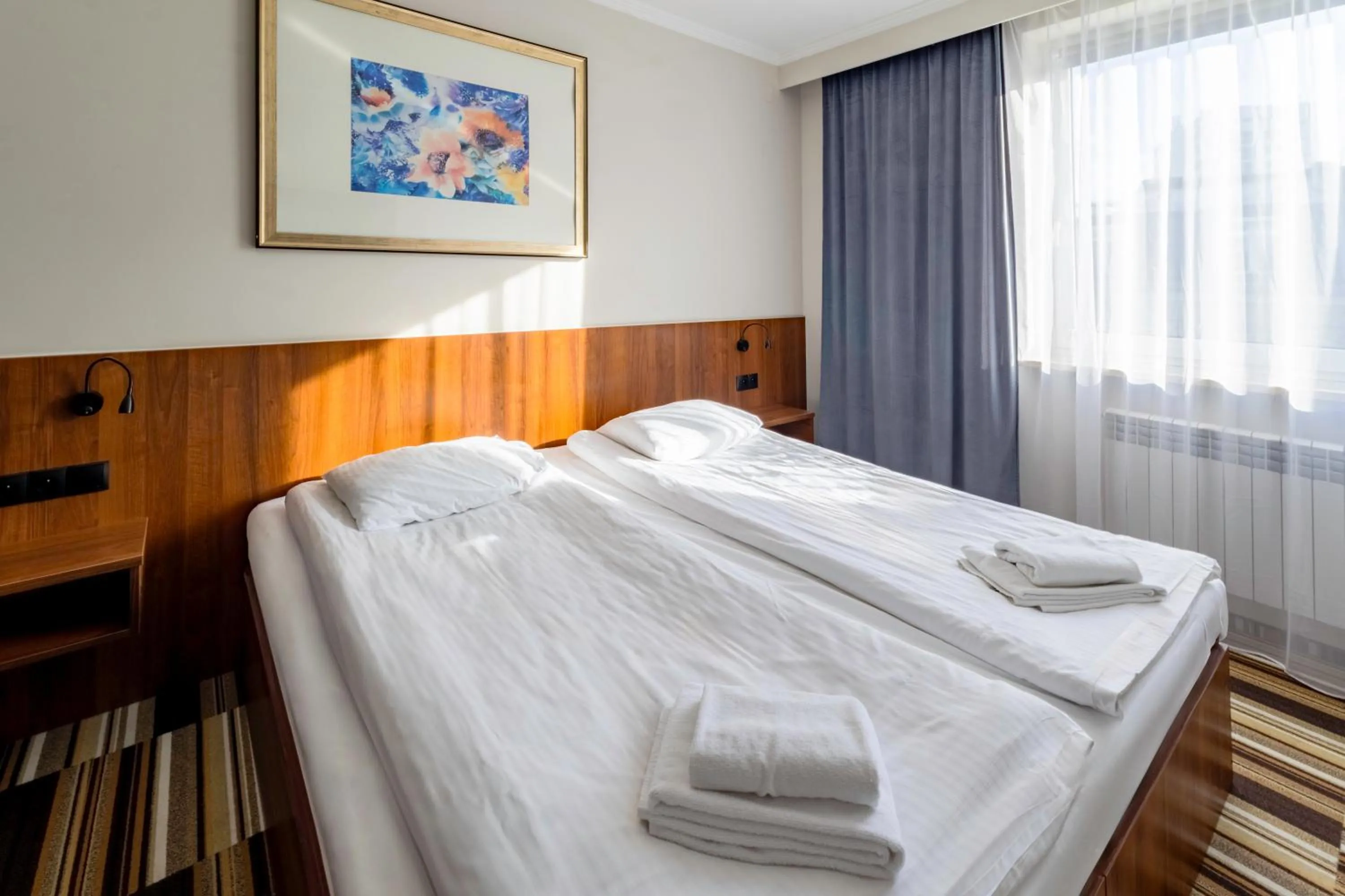 Bed in Noclegi Hit Rooms & Apartments