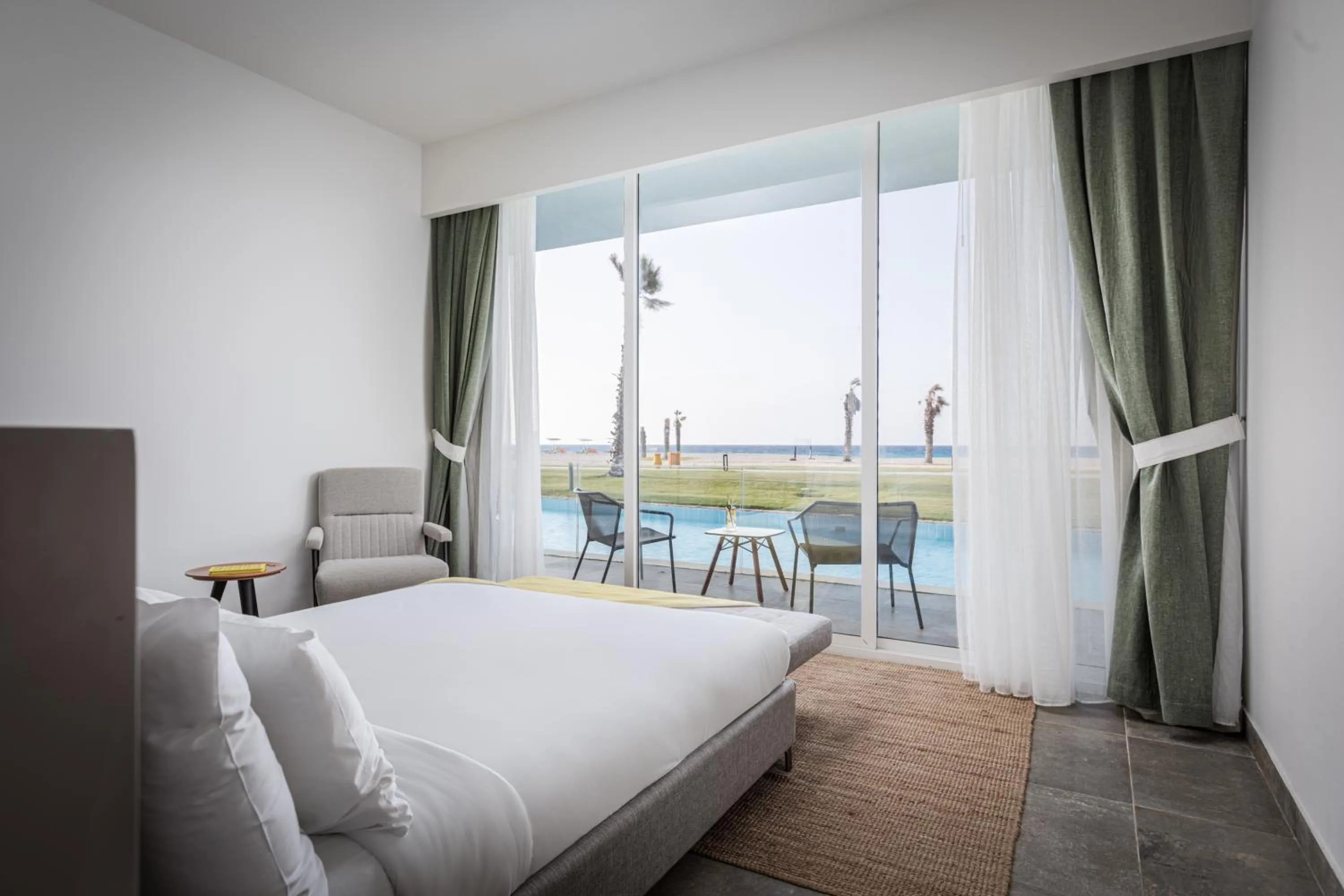 Bed in The G Hotel Seashell