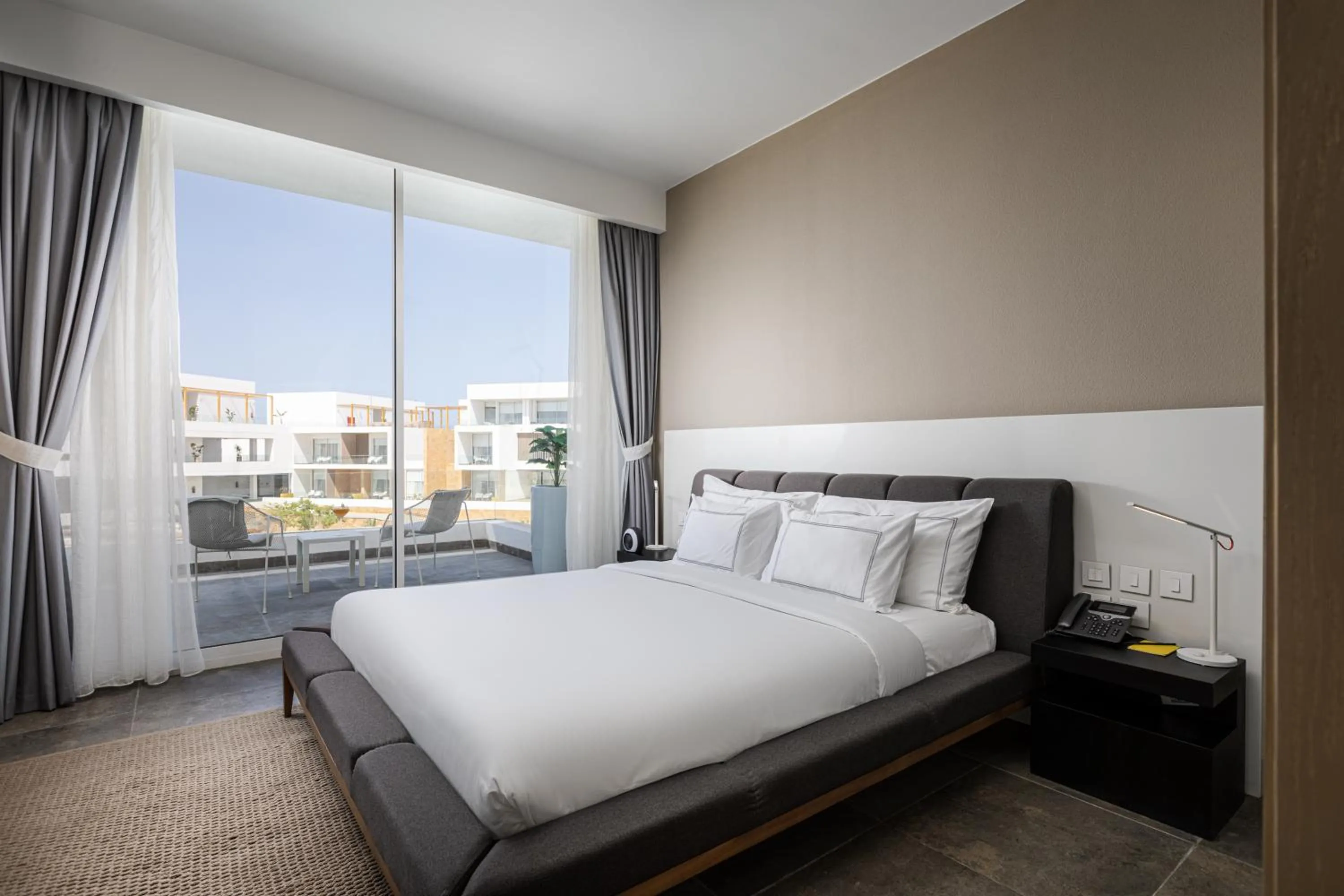 Bed in The G Hotel Seashell