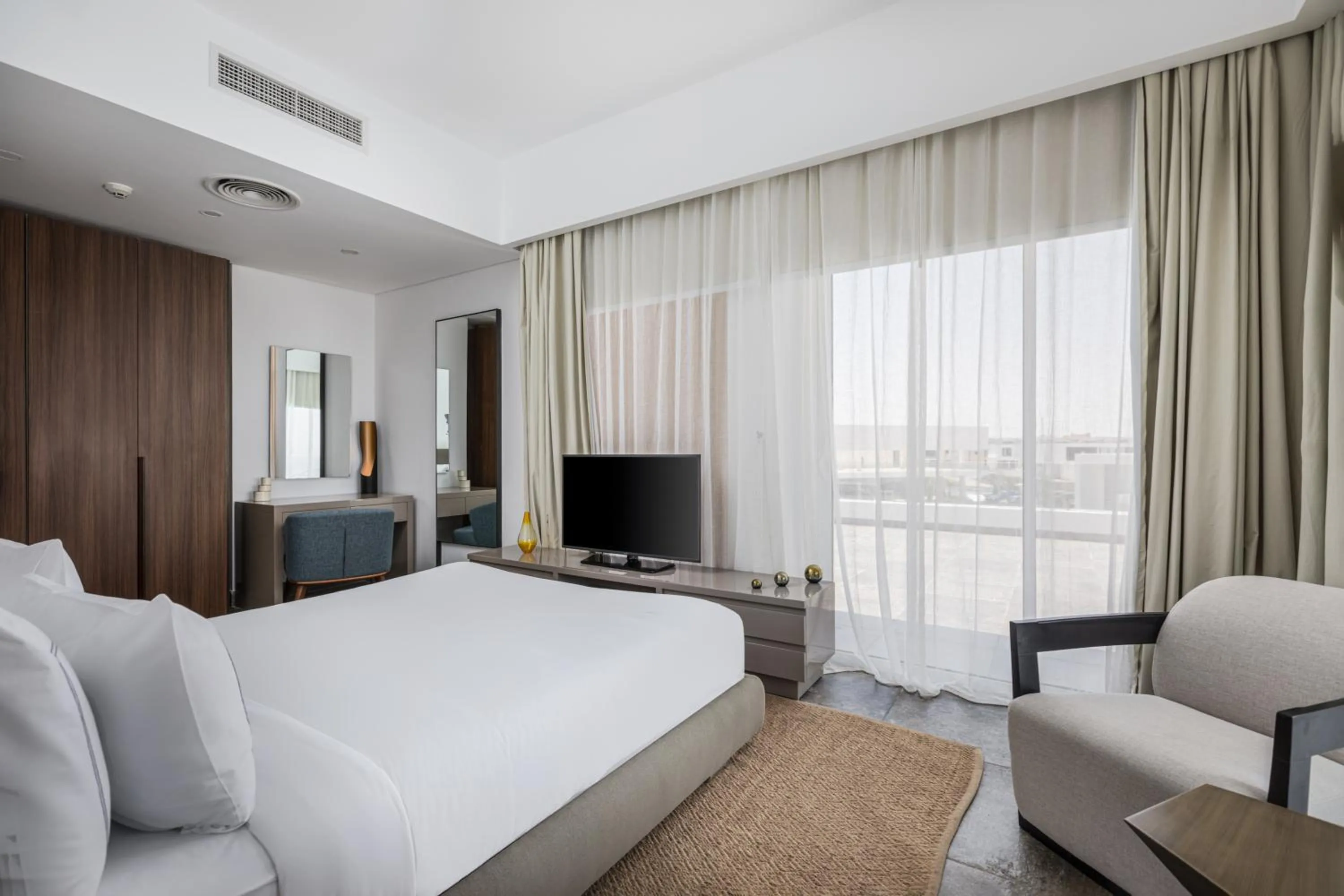 Bed in The G Hotel Seashell