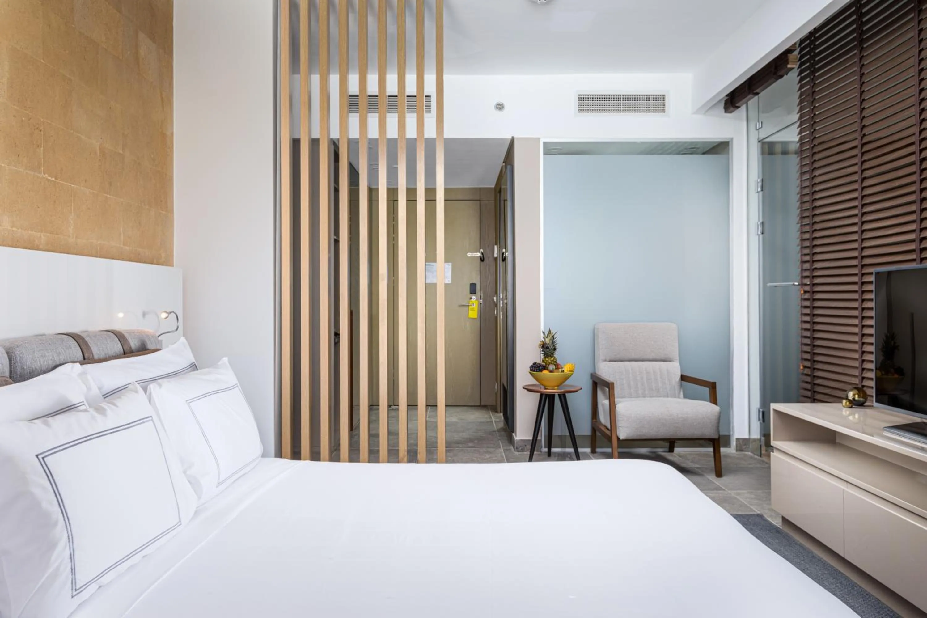 Bed in The G Hotel Seashell