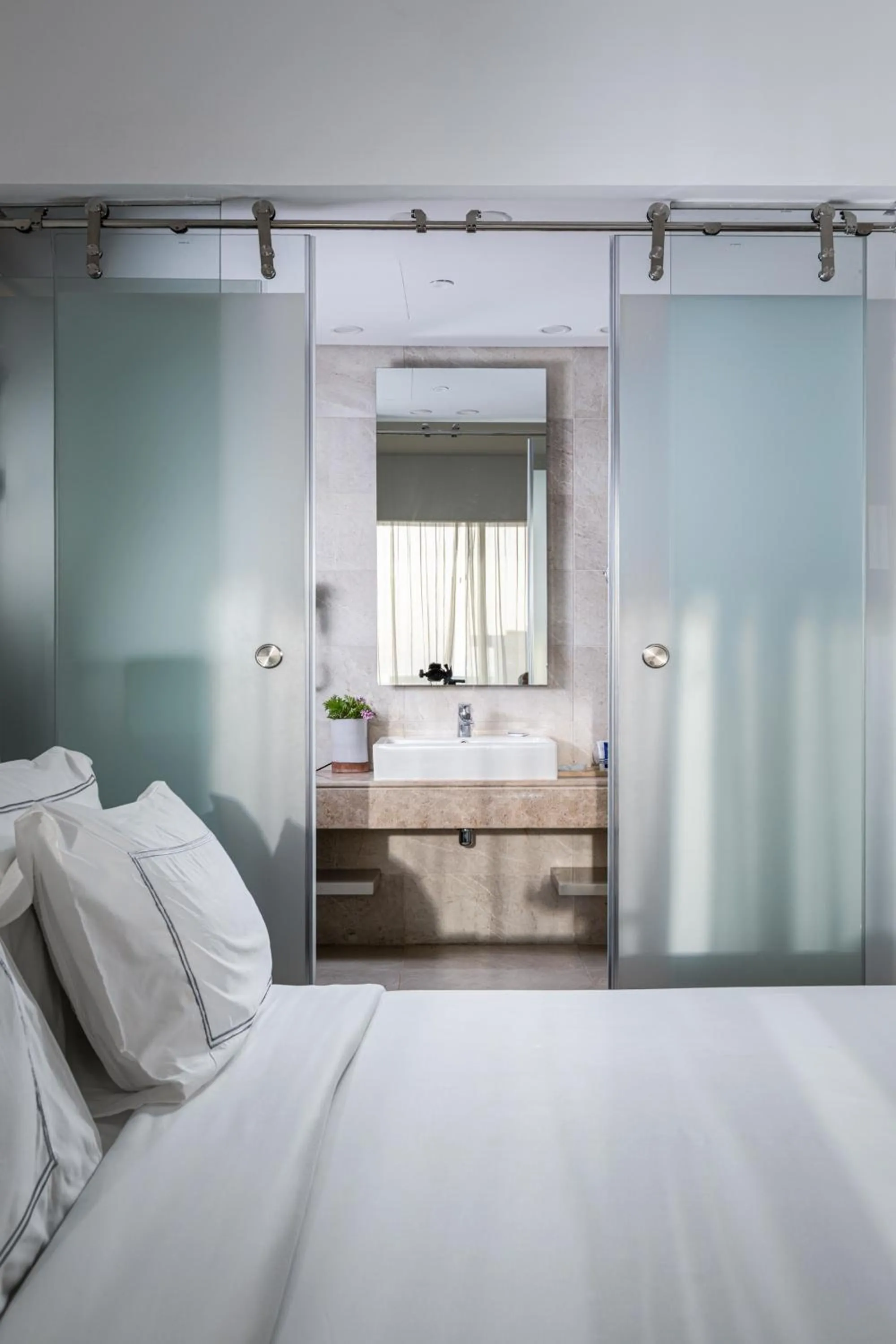 Bed in The G Hotel Seashell