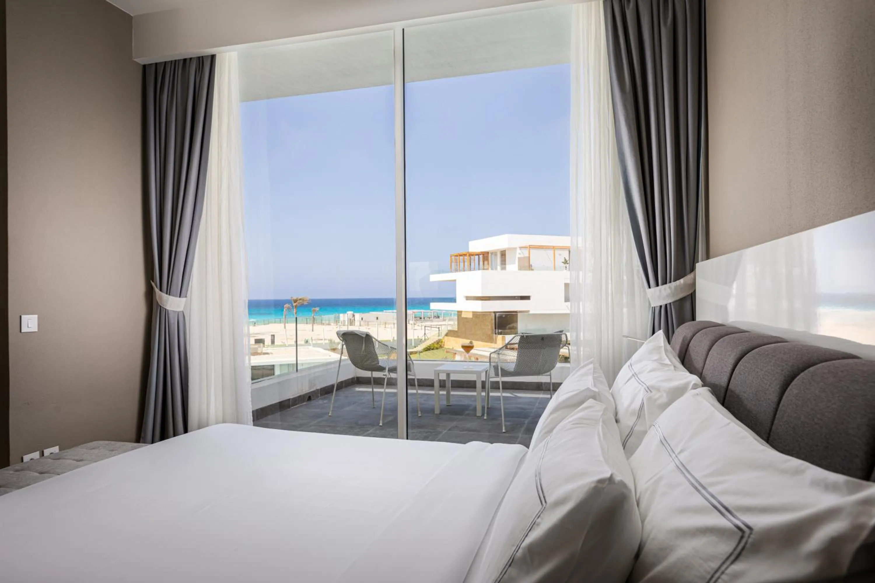 Bed in The G Hotel Seashell