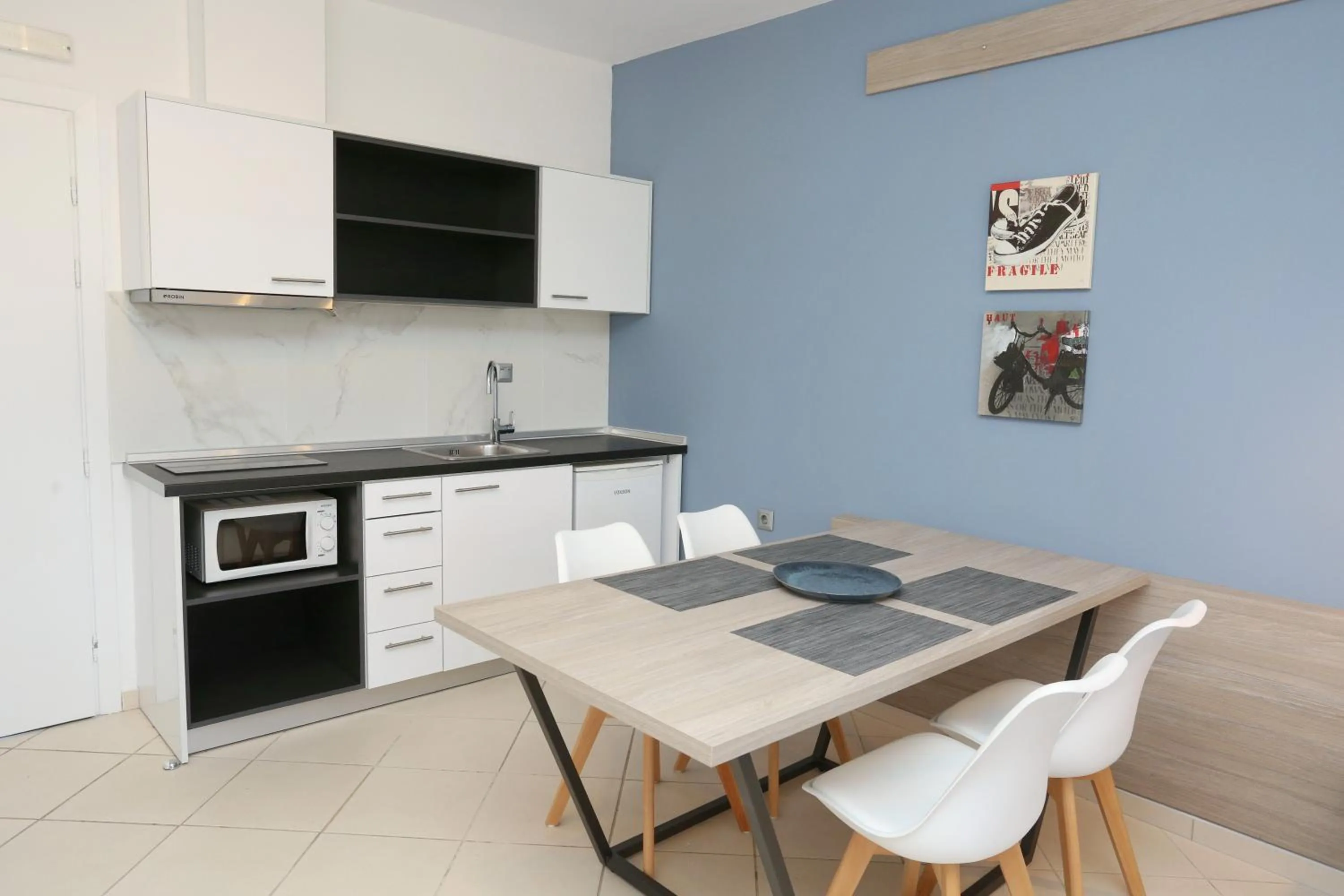 Dining area in Agreste Luxury Apartments