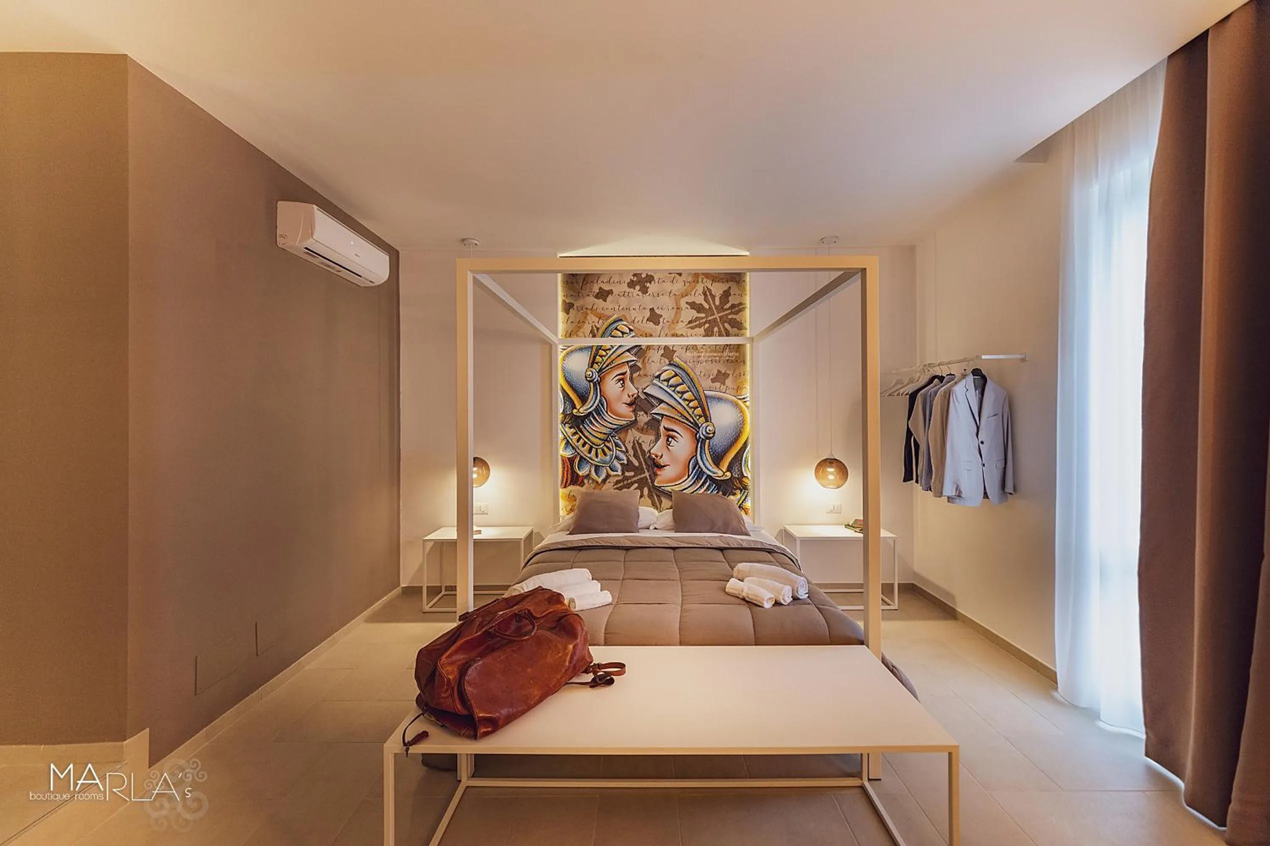 Bed in Marla's boutique rooms