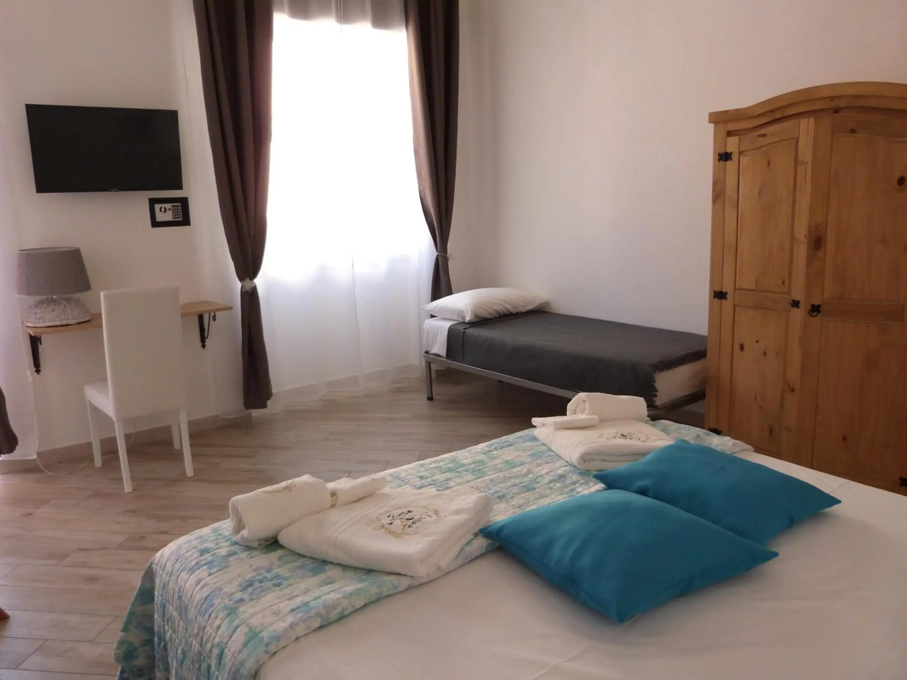 Triple Room in Clelia's Boutique Rooms & Suites Triple Room in Clelia's Boutique Rooms & Suites