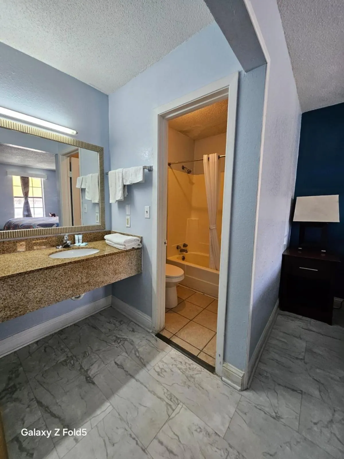 Toilet in Rodeway Inn Hattiesburg North