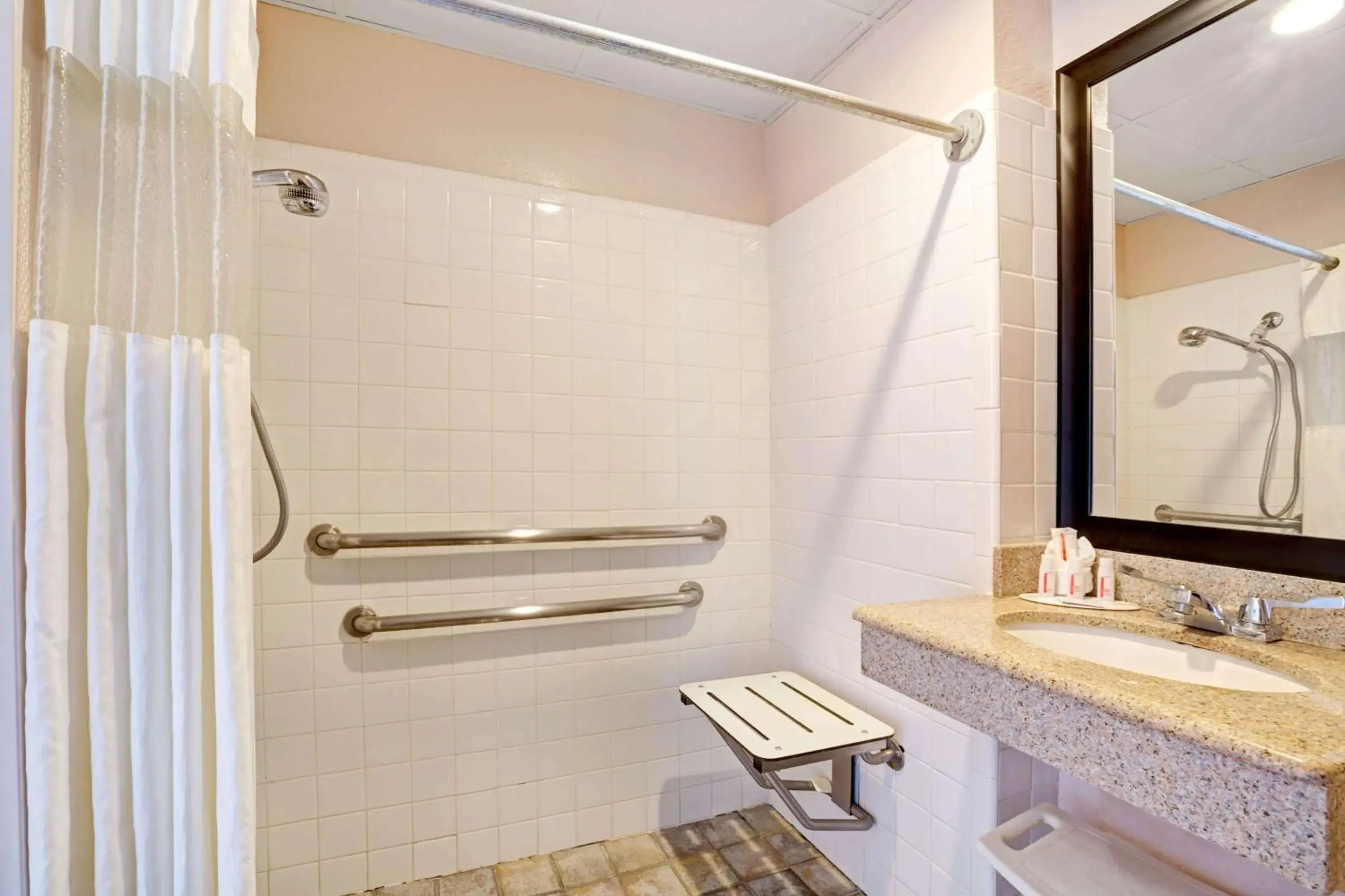 Bathroom in Howard Johnson by Wyndham Galveston