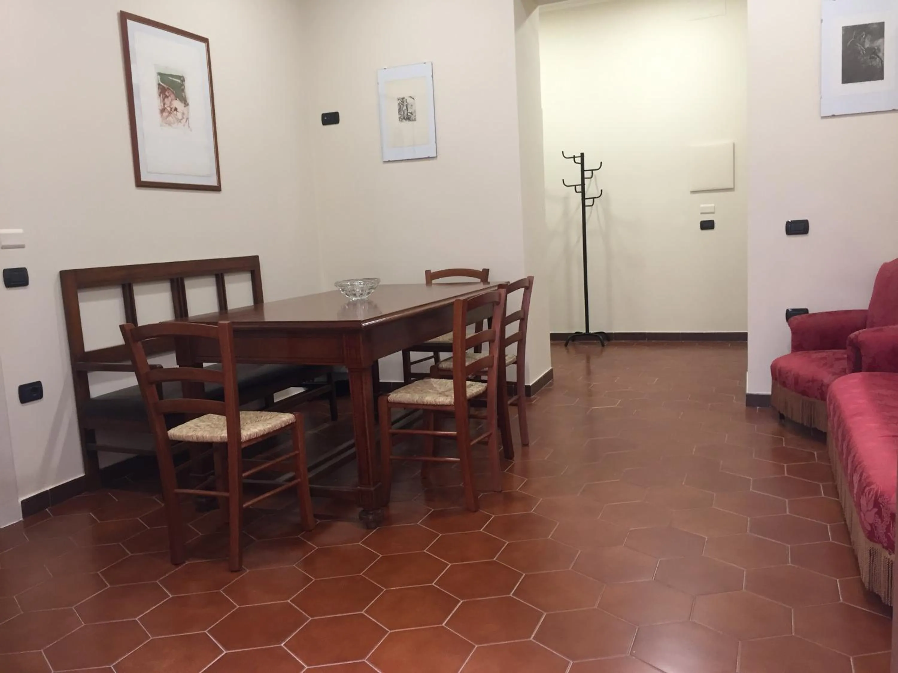 Communal lounge/ TV room in B&B Duomo Pizzo ApartHotel