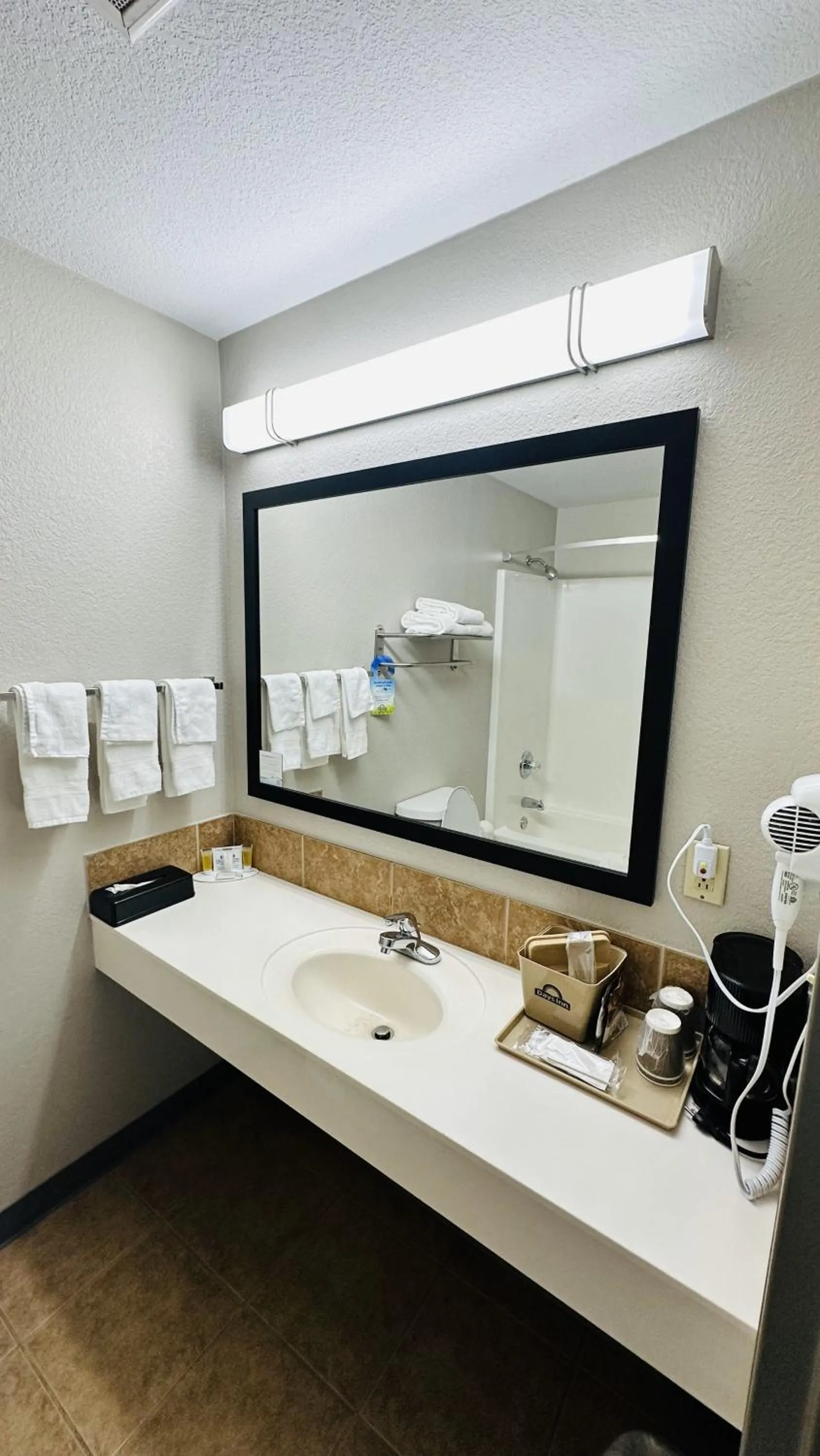Bathroom in Days Inn & Suites by Wyndham Wynne