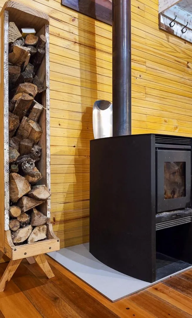 fireplace in Pousada Caminhos da Natureza