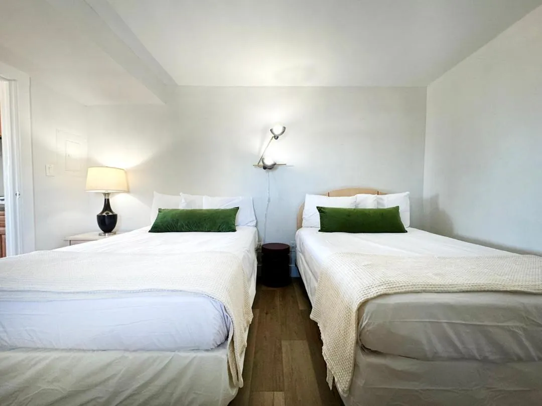 Bed in Coliseum Ocean Resort