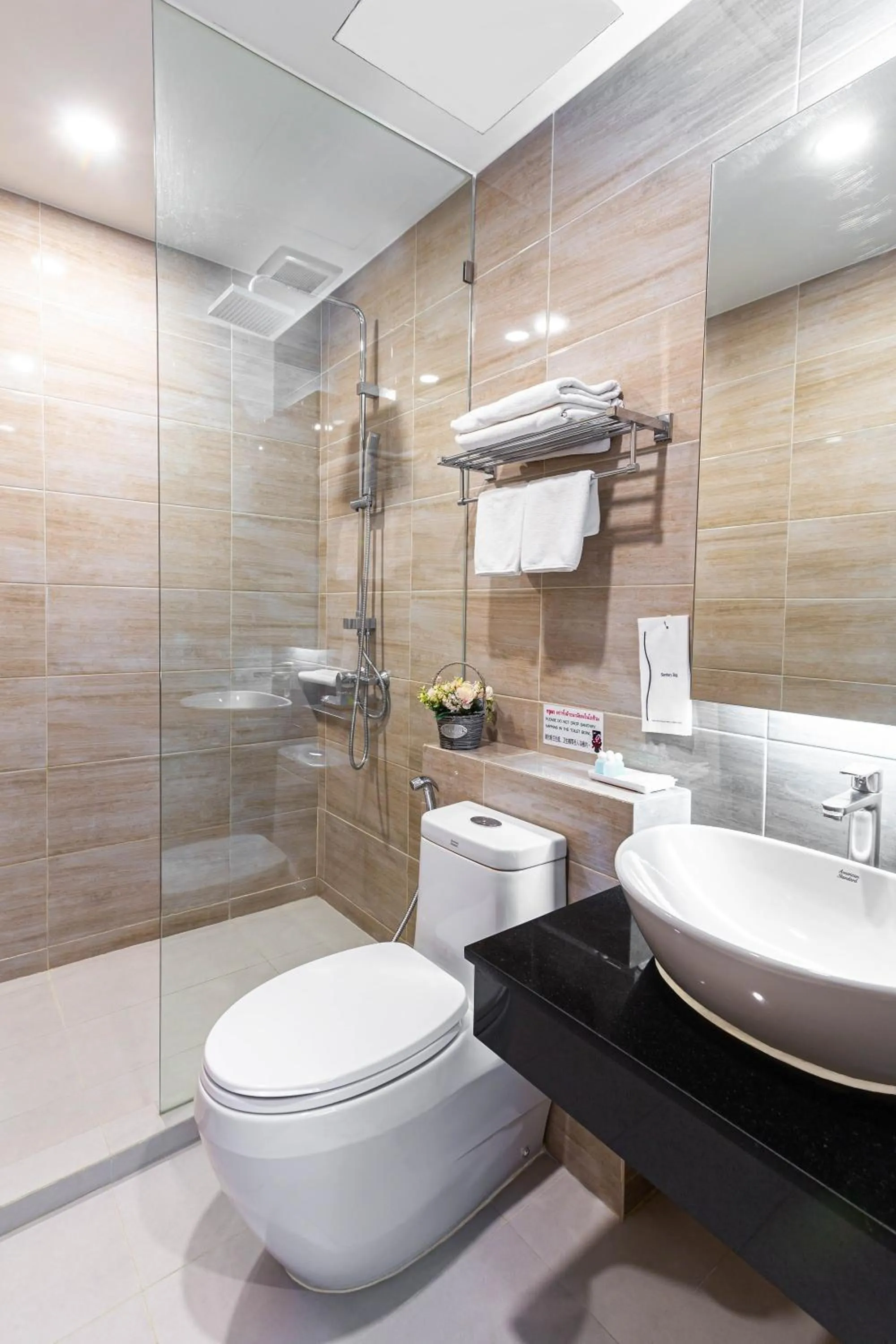 Bathroom in Leela Orchid Hotel