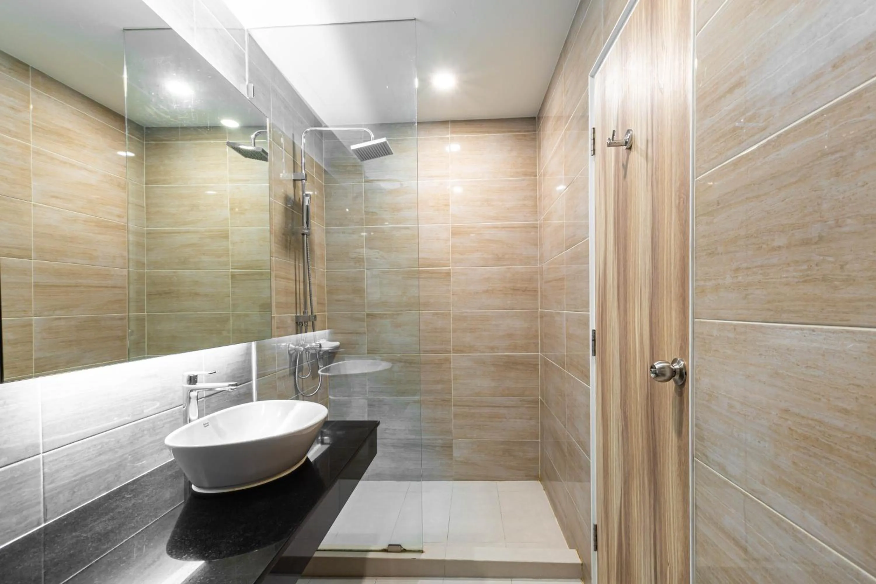 Bathroom in Leela Orchid Hotel