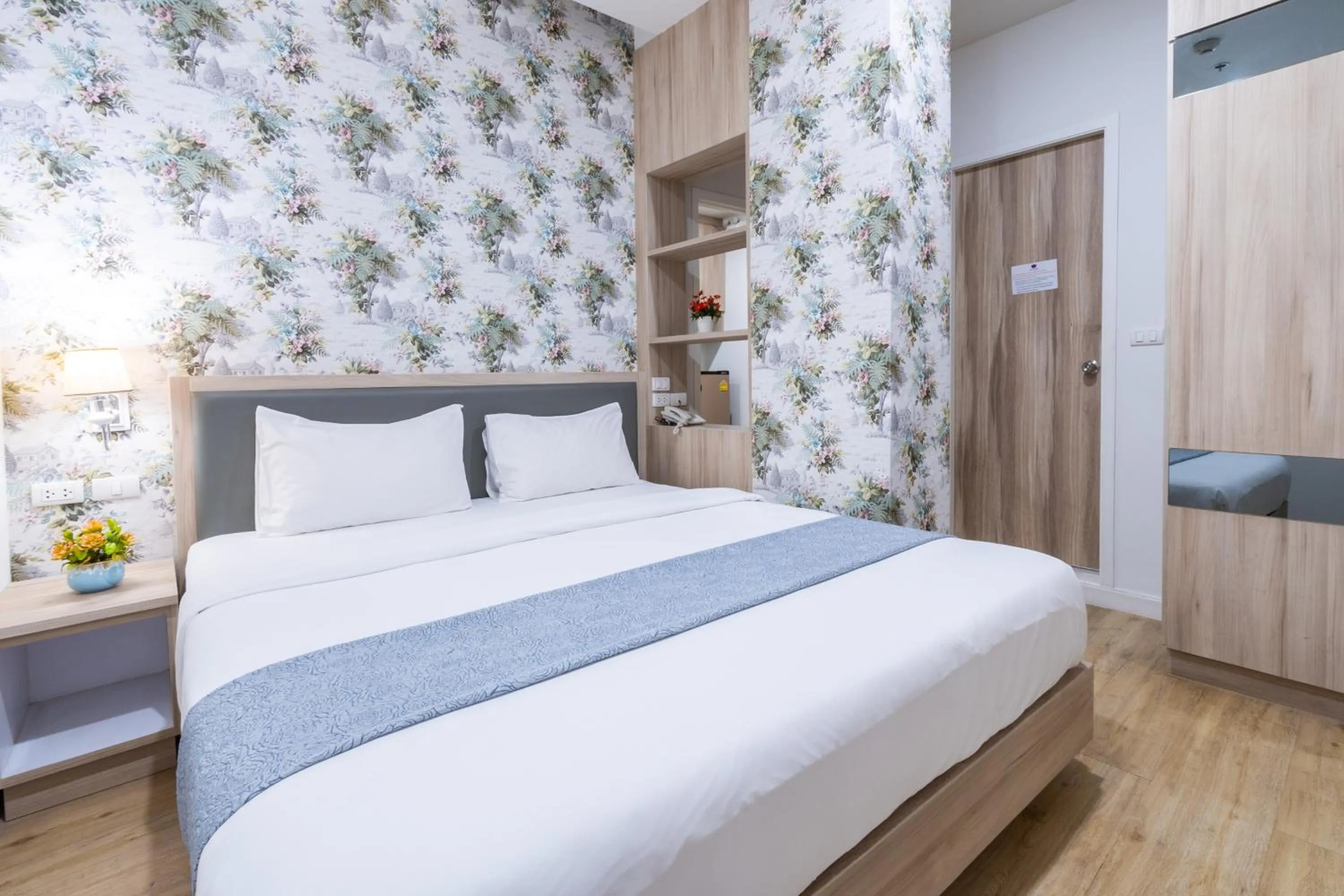 Bed in Leela Orchid Hotel