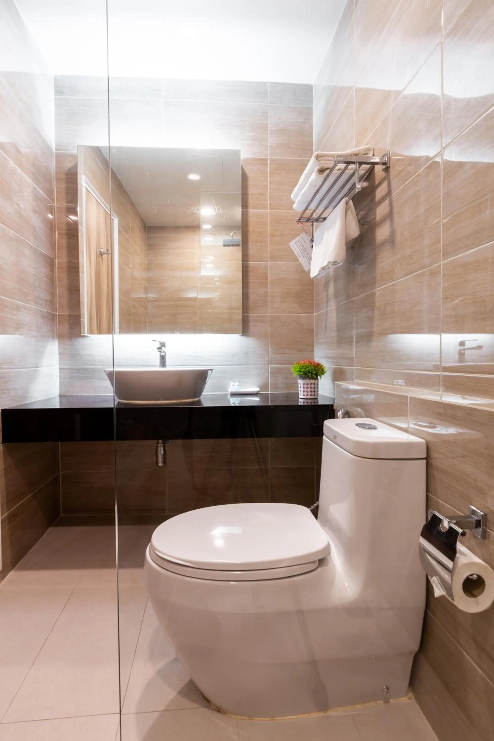 Bathroom in Leela Orchid Hotel