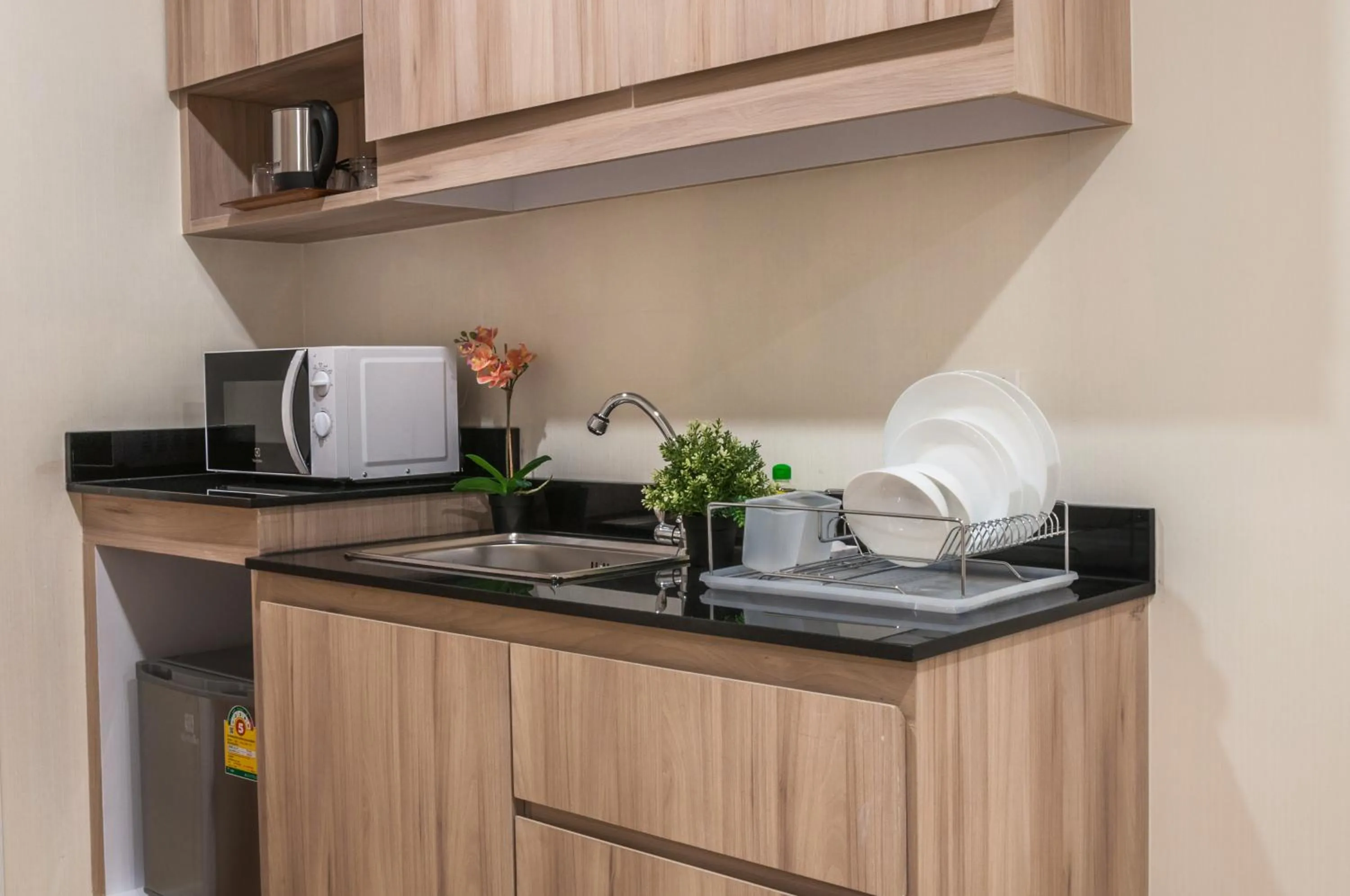 Kitchen or kitchenette in Leela Orchid Hotel