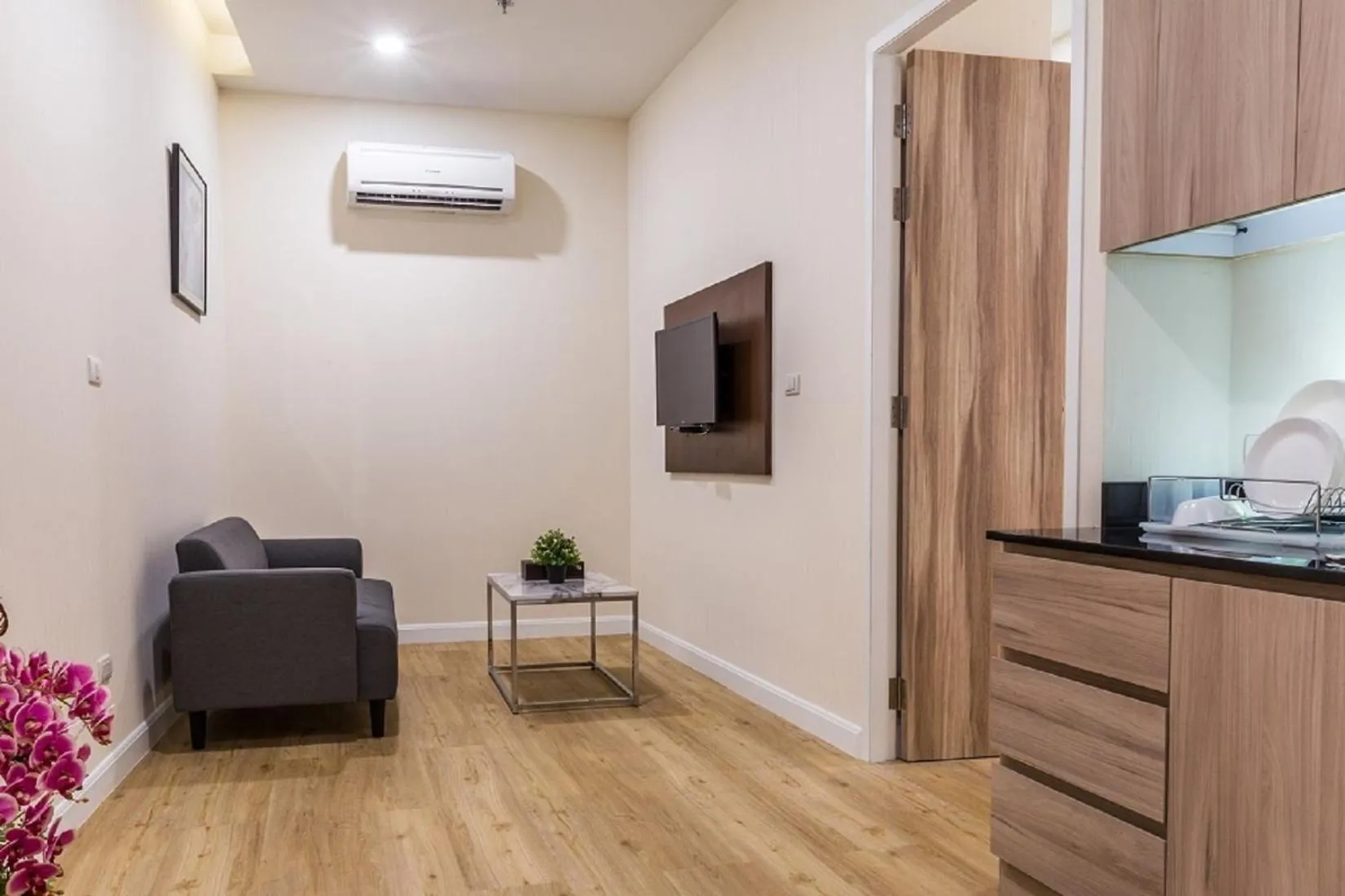 Living room in Leela Orchid Hotel