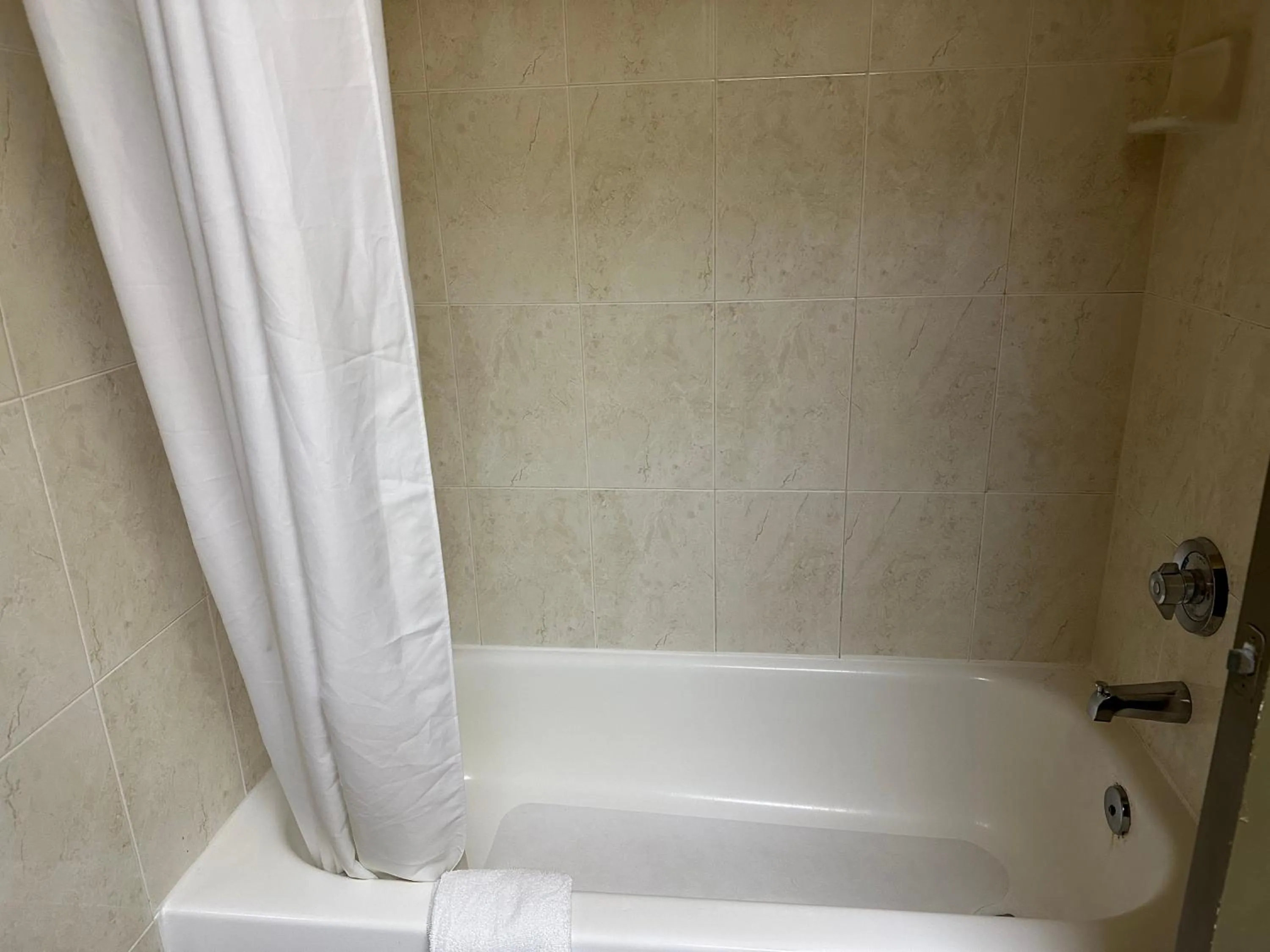 Shower in Super 8 by Wyndham Intercontinental Houston TX