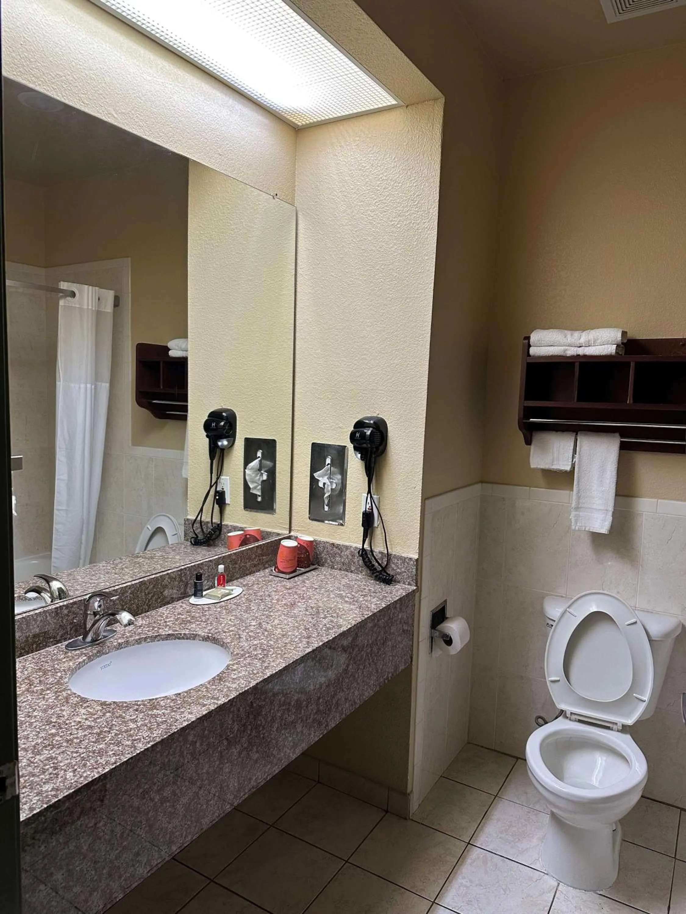 Bathroom in Super 8 by Wyndham Intercontinental Houston TX