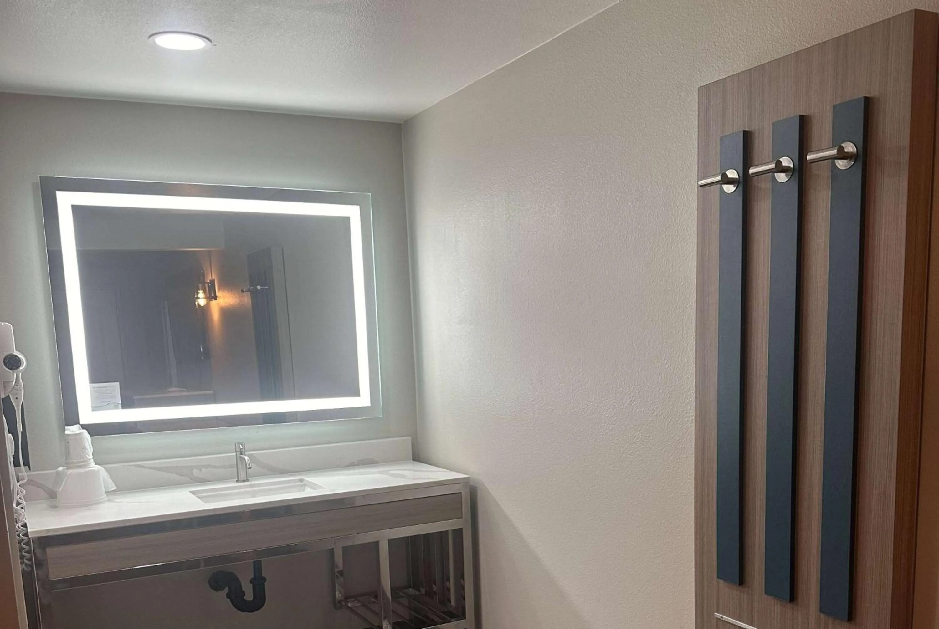 Bathroom in Super 8 by Wyndham Oceanside Downtown