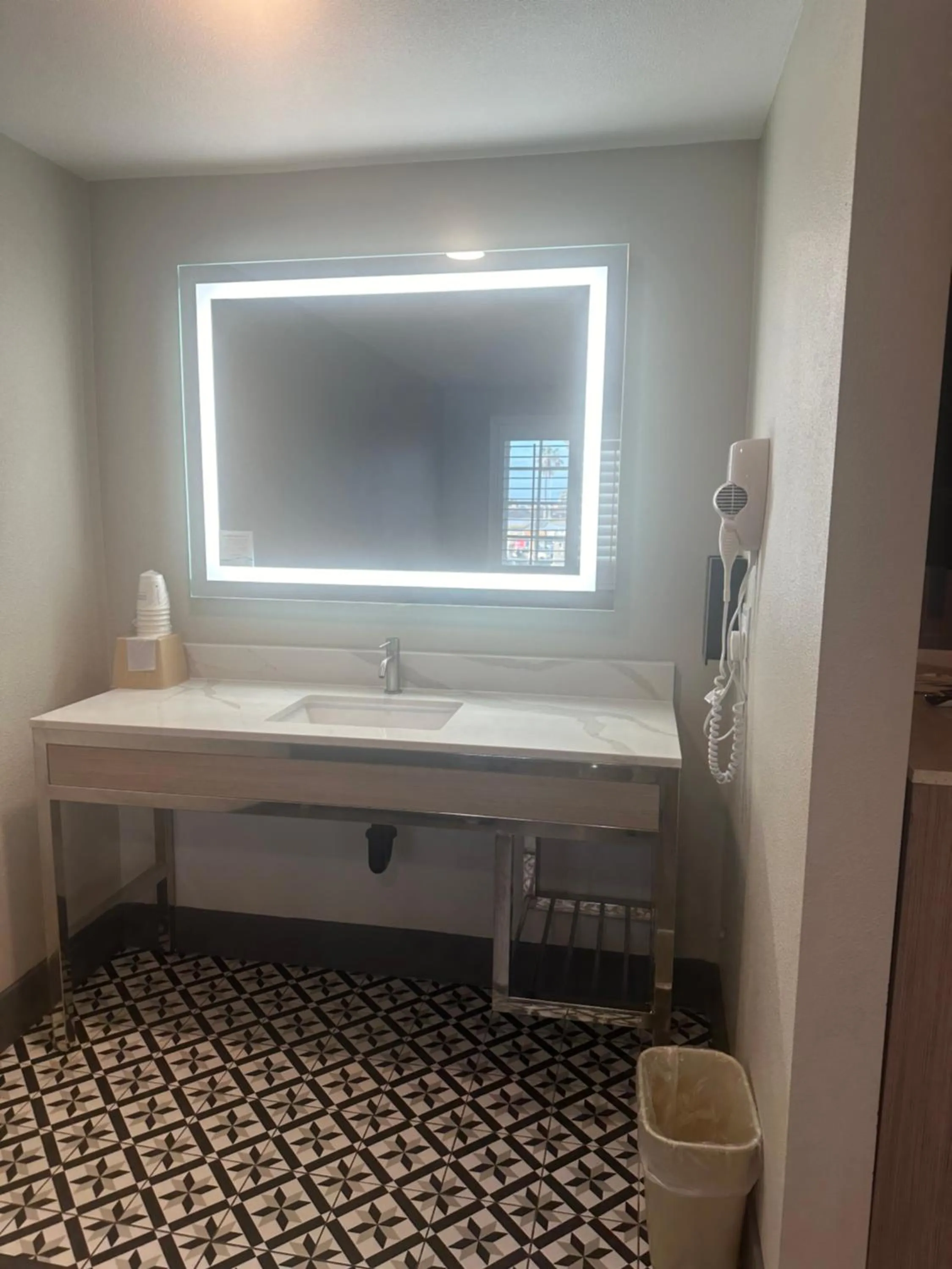 Bathroom in Super 8 by Wyndham Oceanside Downtown