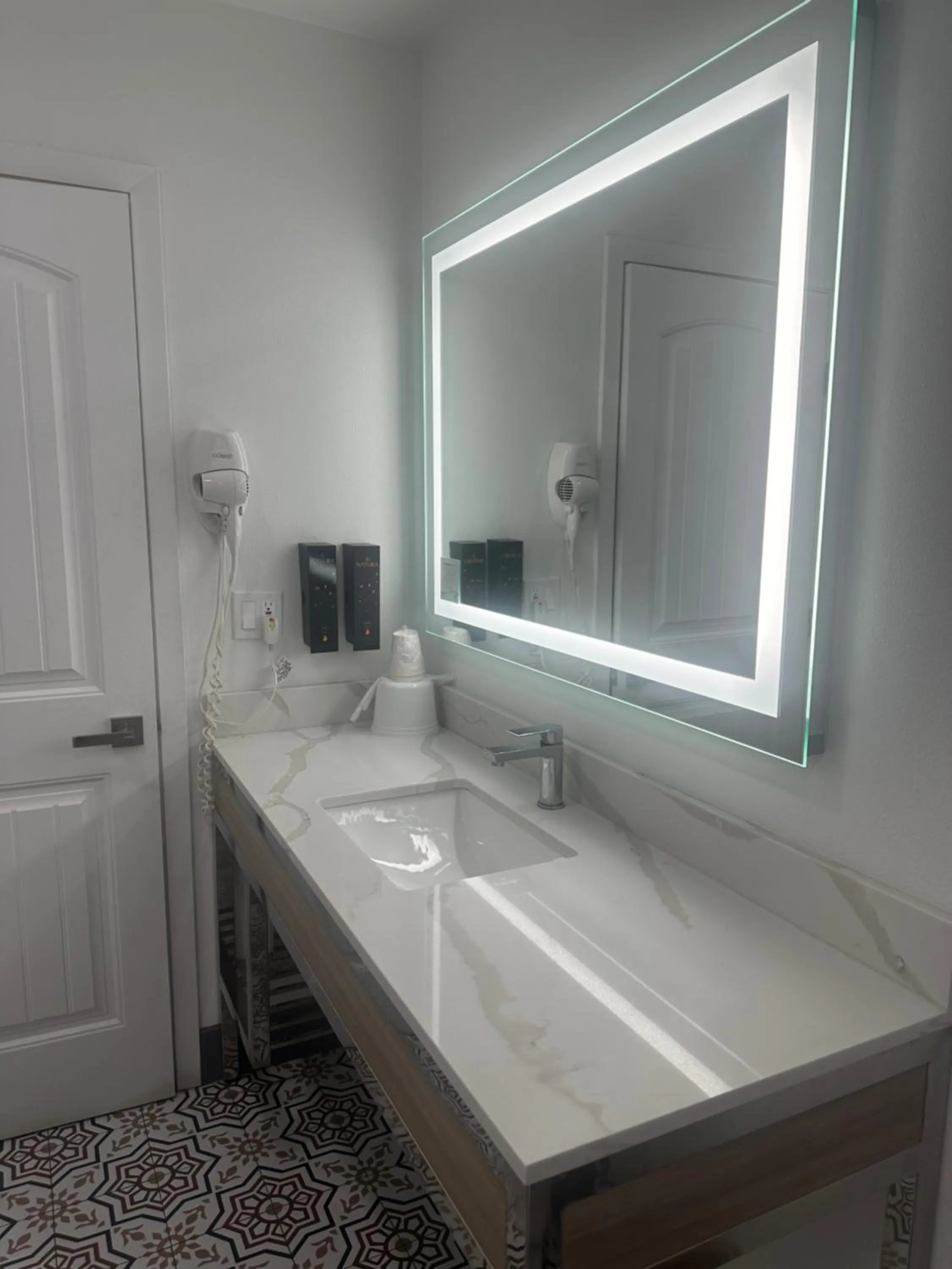 Bathroom in Super 8 by Wyndham Oceanside Downtown