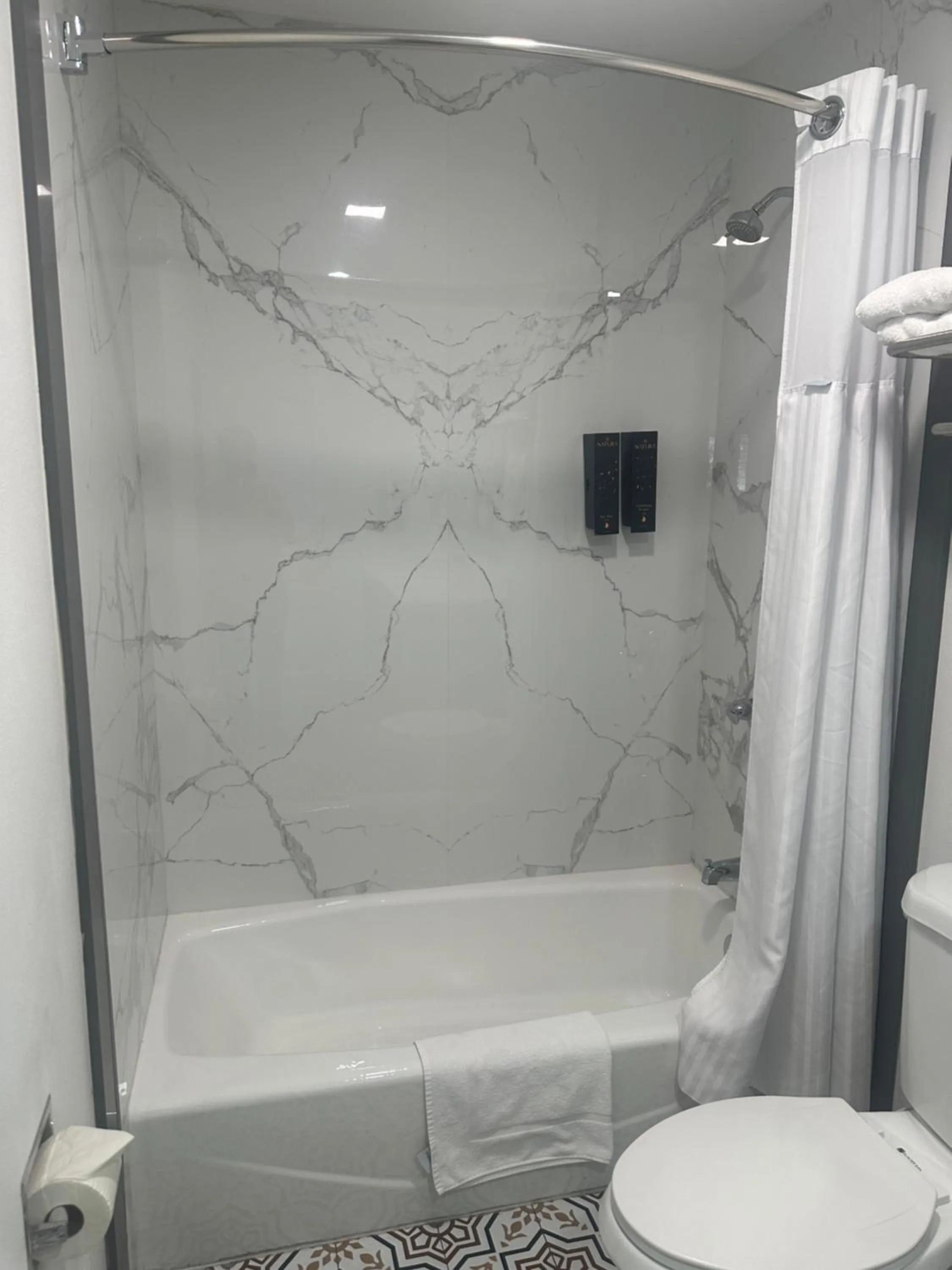 Bathroom in Super 8 by Wyndham Oceanside Downtown