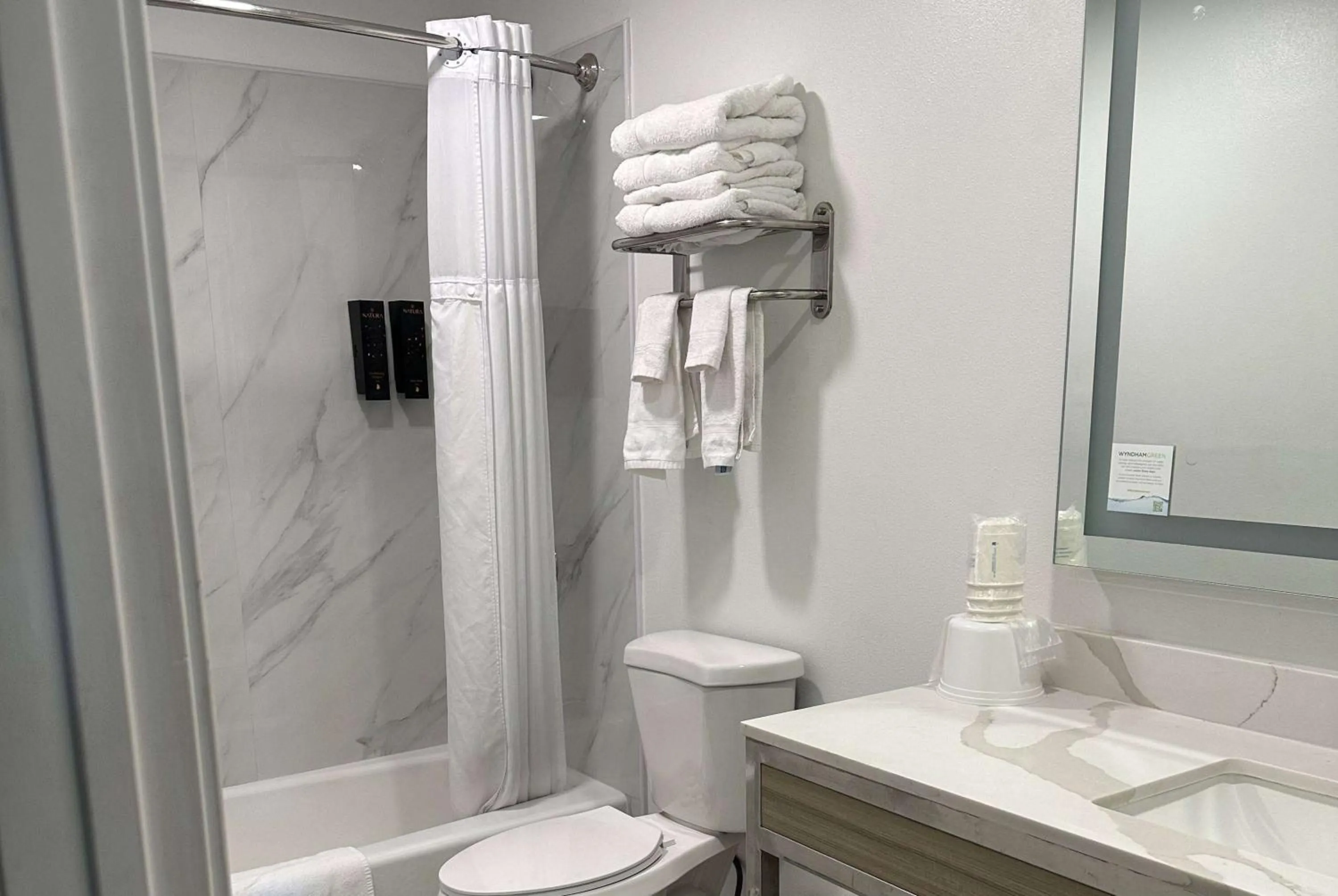 Bathroom in Super 8 by Wyndham Oceanside Downtown