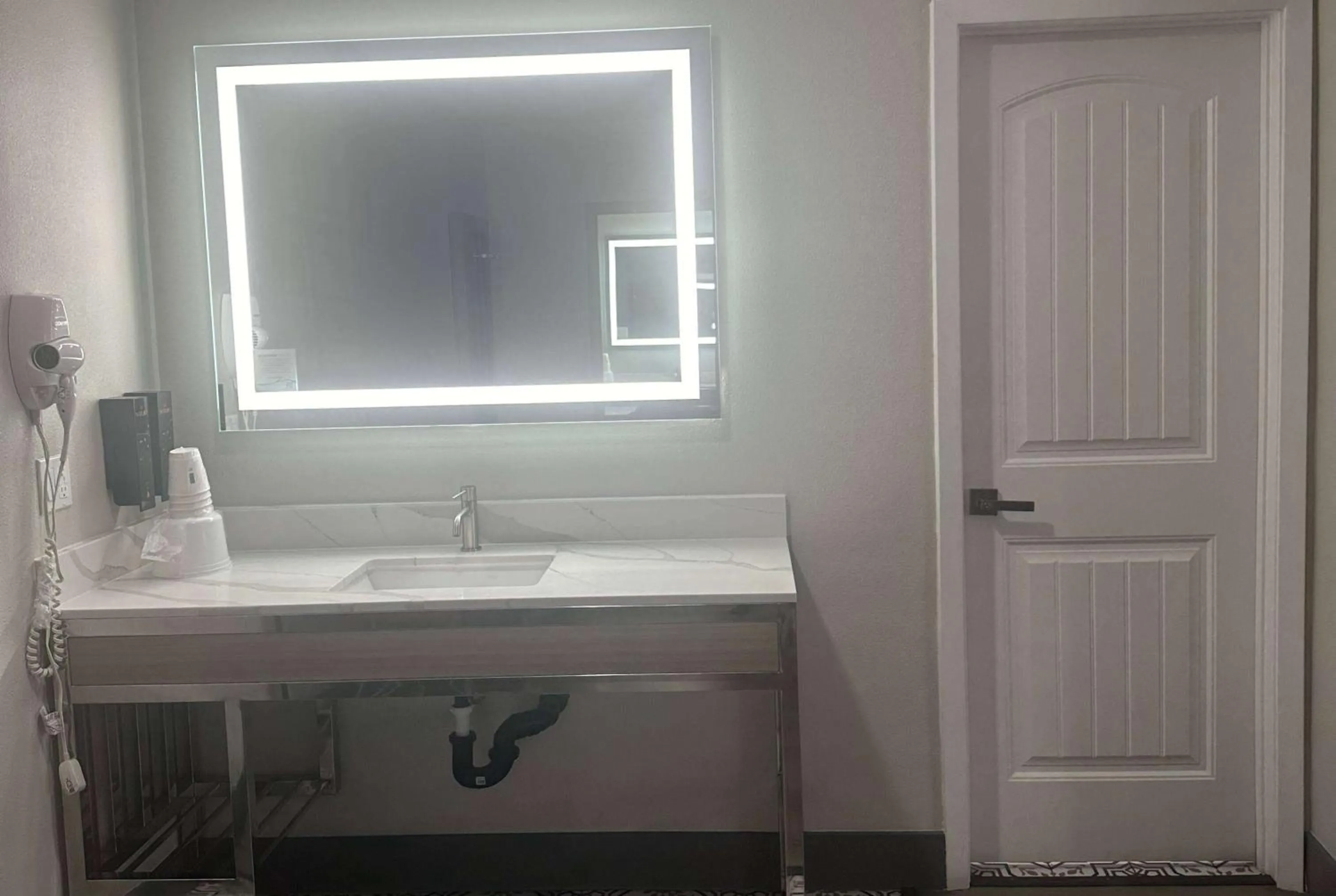 Bathroom in Super 8 by Wyndham Oceanside Downtown