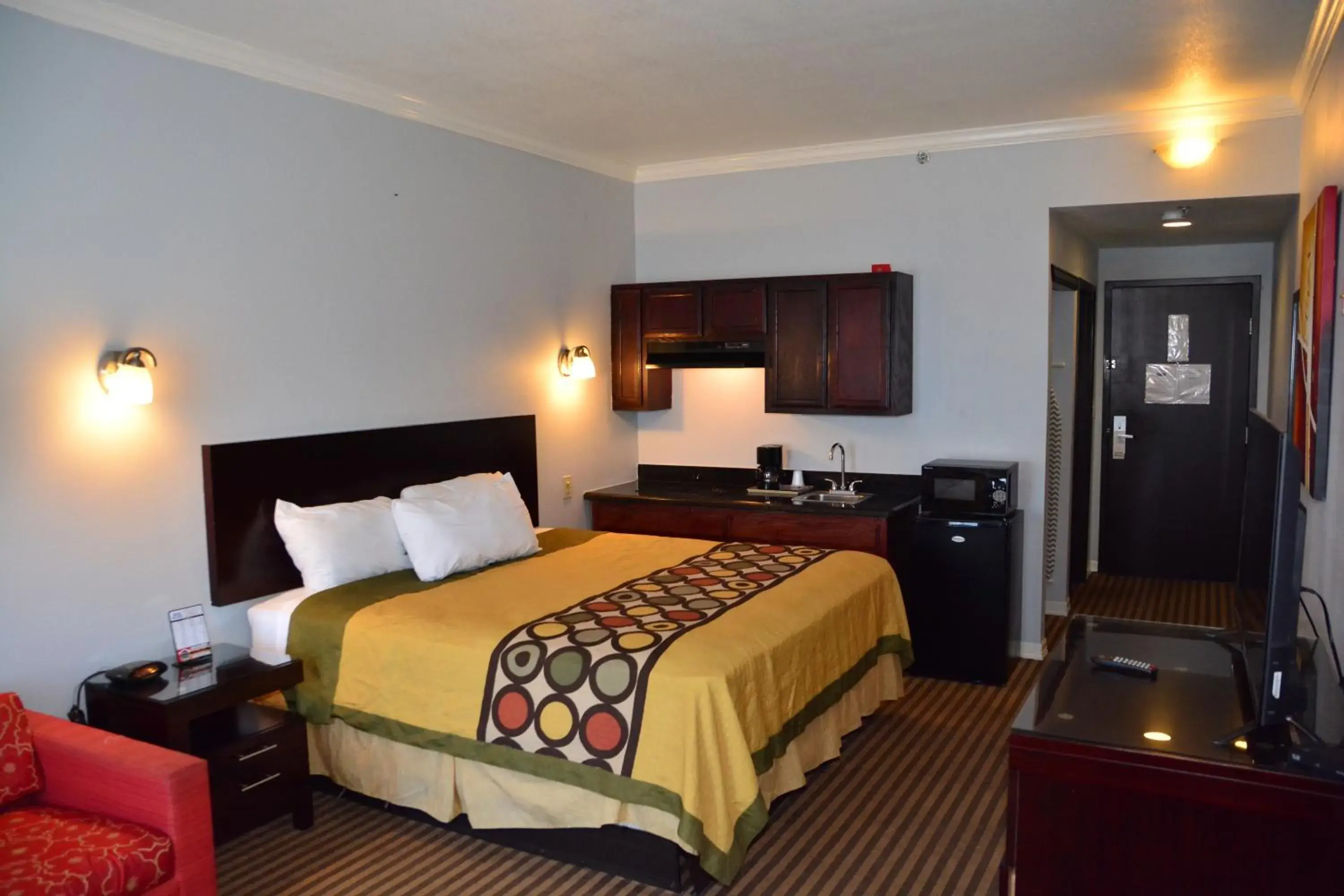 Bed in Blue Bay Inn and Suites Bed in Blue Bay Inn and Suites