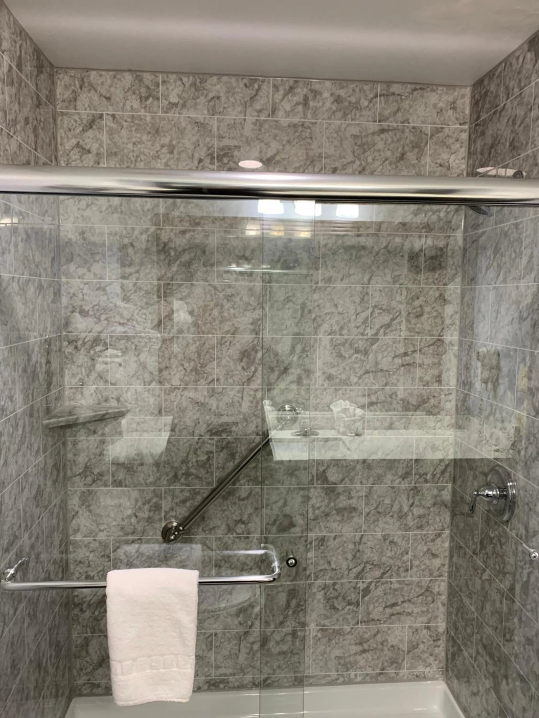 Shower in Blue Bay Inn and Suites