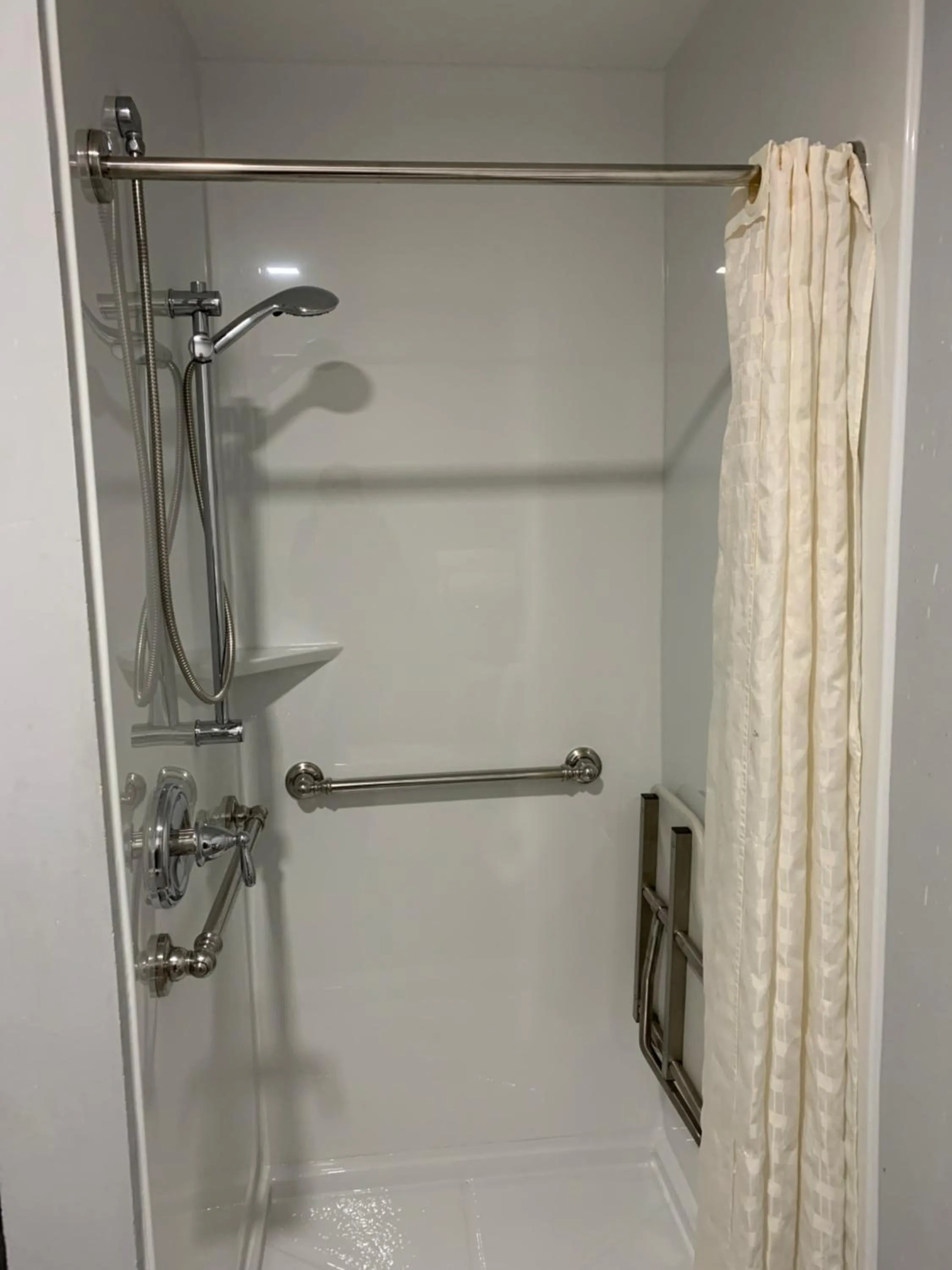 Shower in Blue Bay Inn and Suites