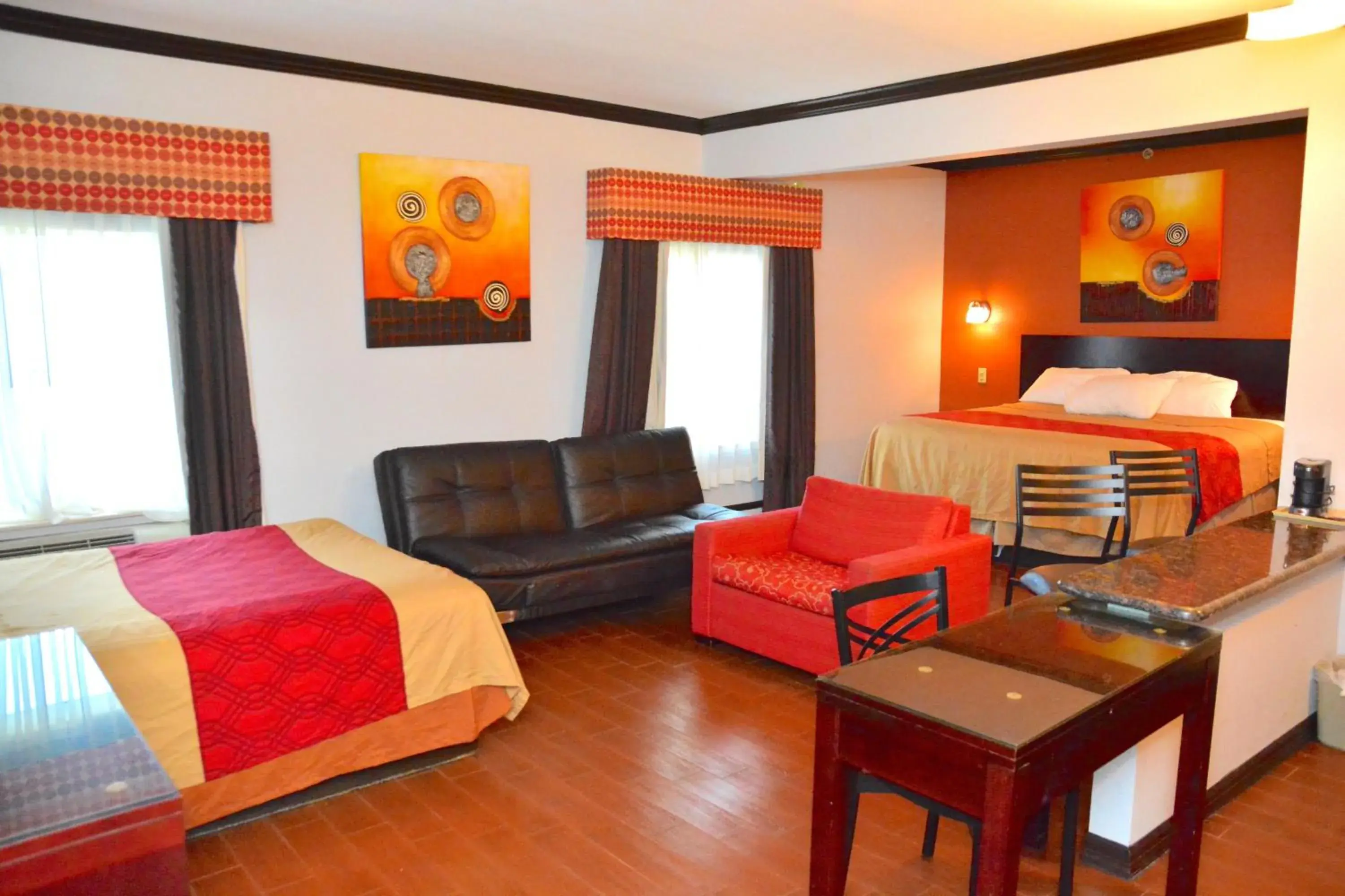 Bed in Blue Bay Inn and Suites Bed in Blue Bay Inn and Suites