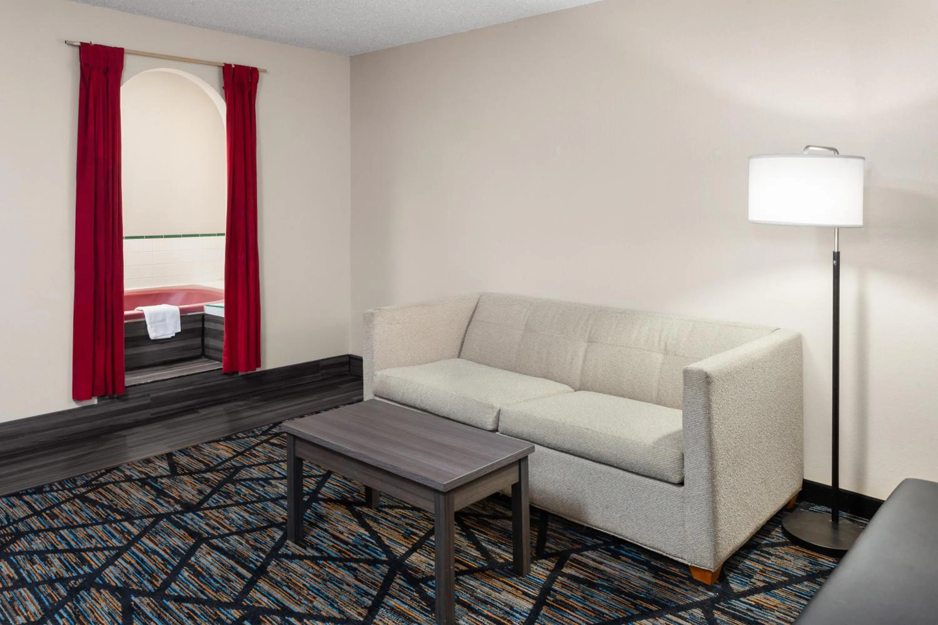 Living room in Super 8 by Wyndham Mt. Vernon