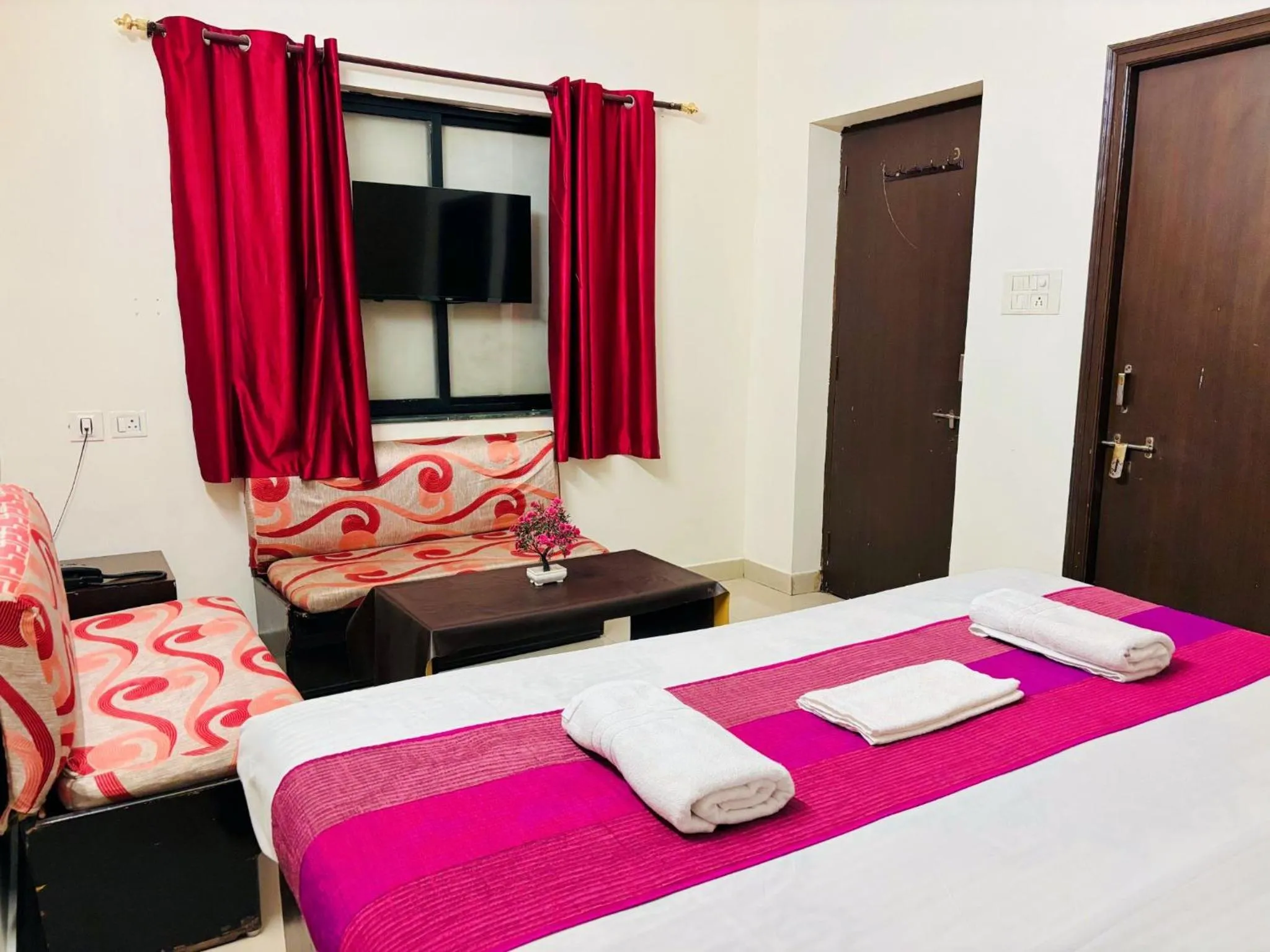 Bed in Hotel Sunrise Inn