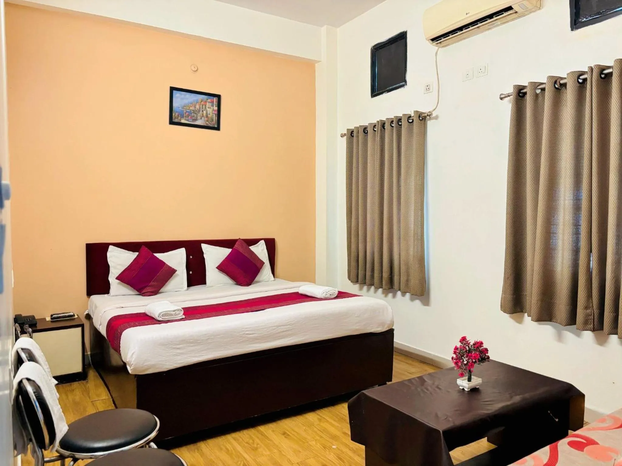 Bed in Hotel Sunrise Inn