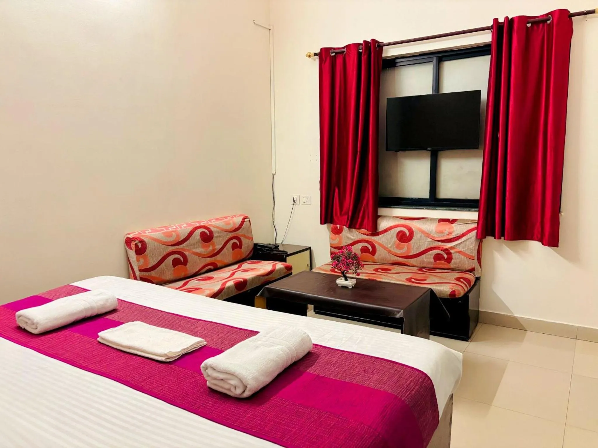 Bed in Hotel Sunrise Inn