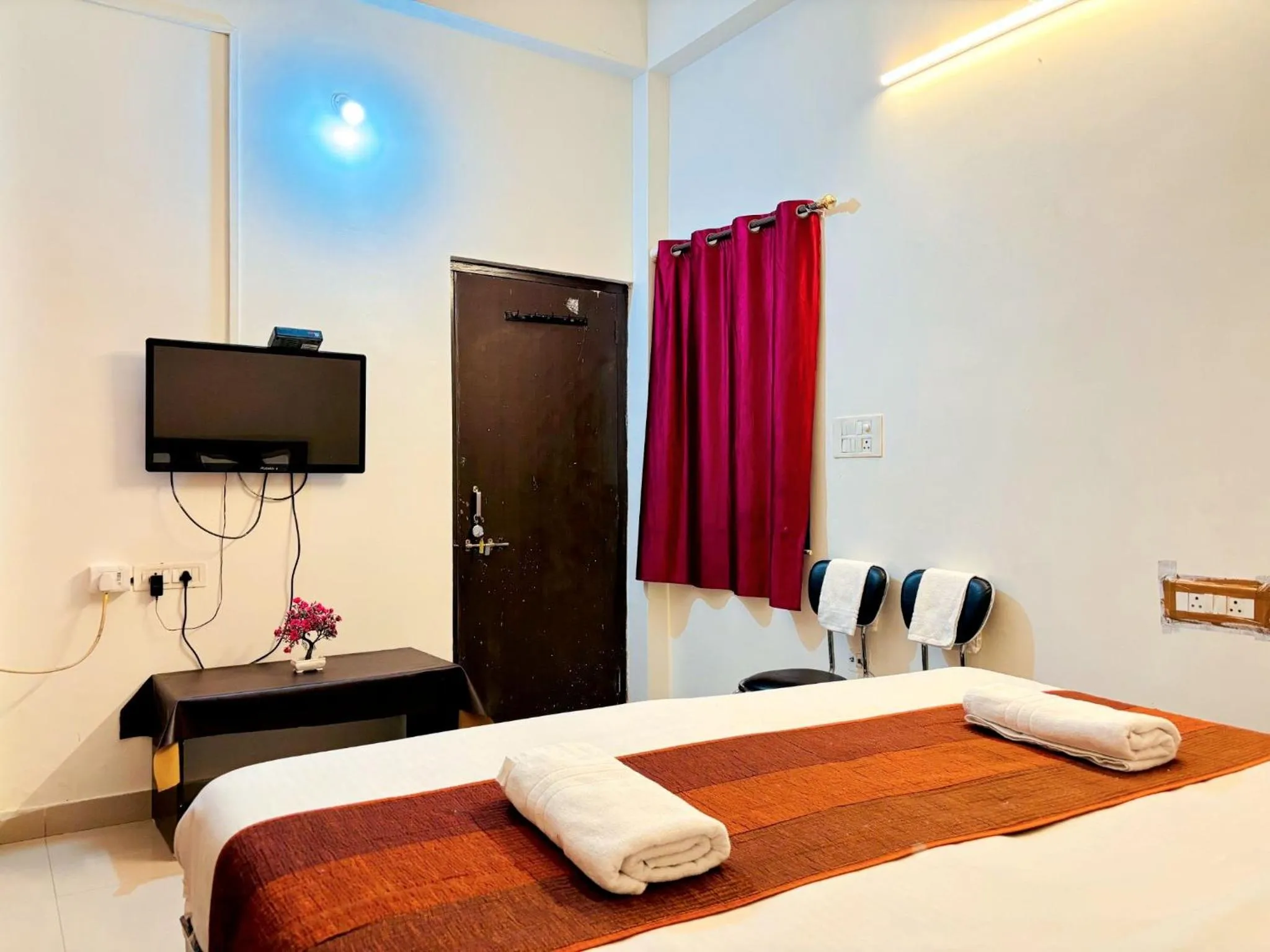 Bed in Hotel Sunrise Inn