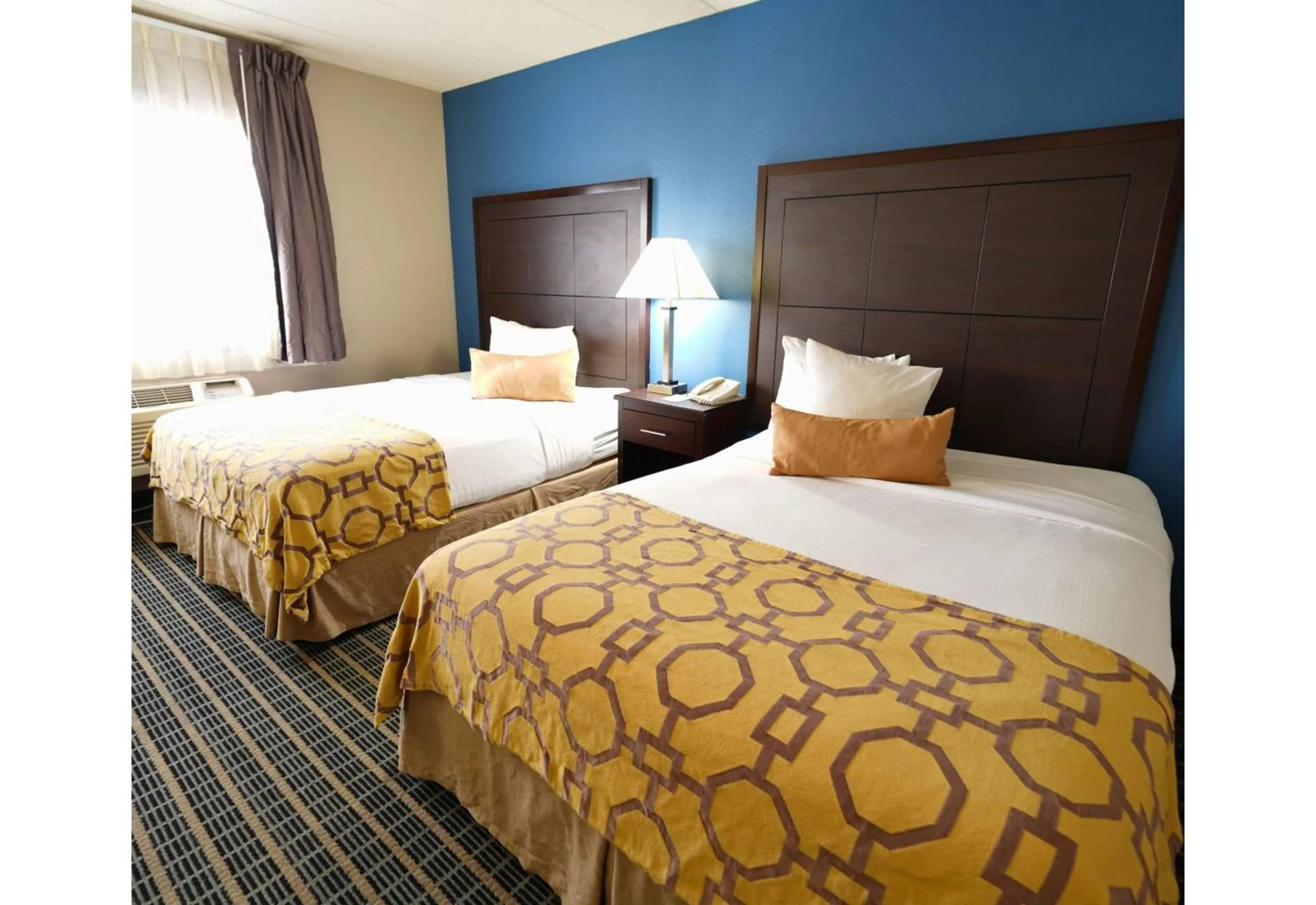 Photo of the whole room, Bed in Baymont by Wyndham Marshalltown