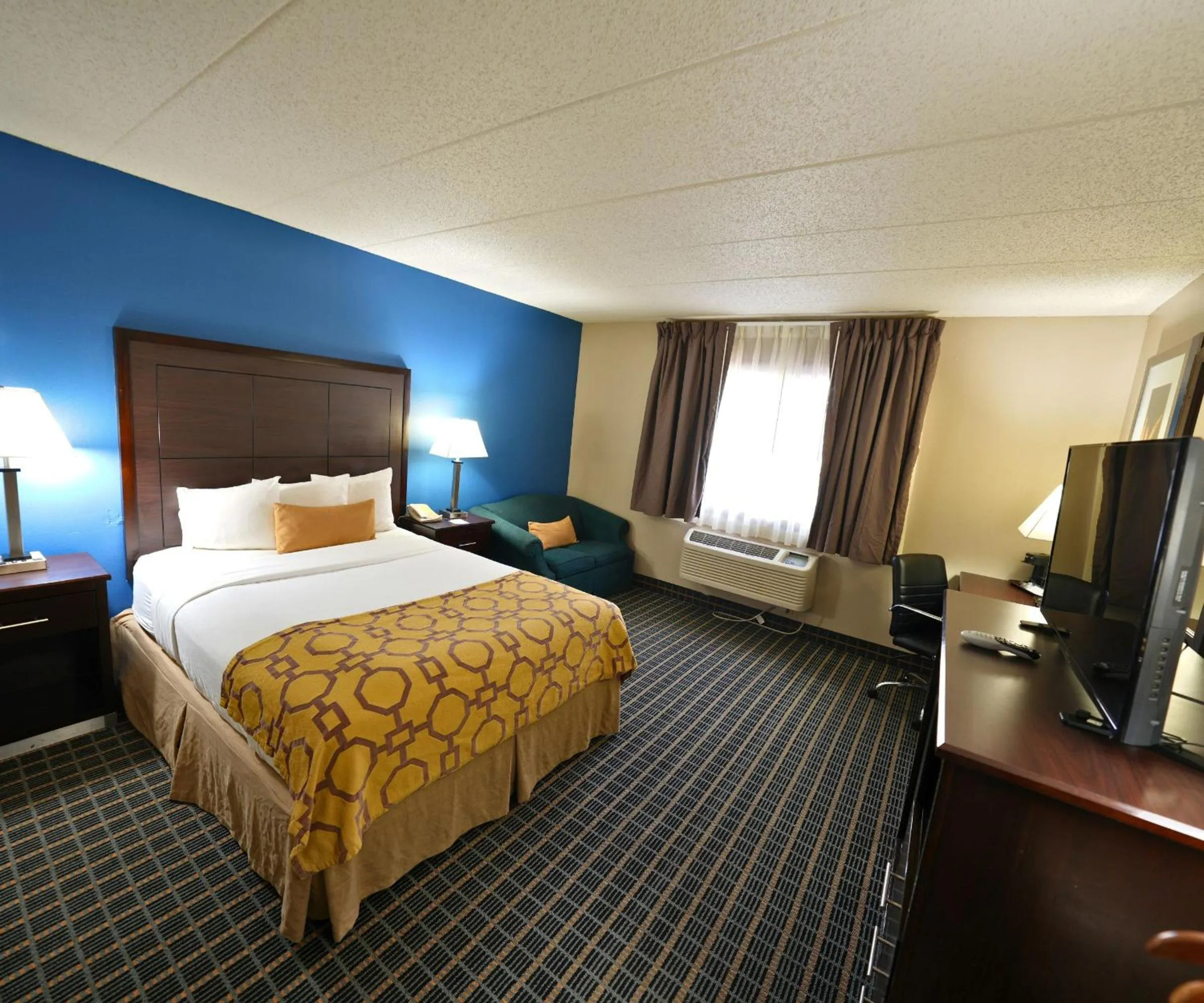 Bed in Baymont by Wyndham Marshalltown