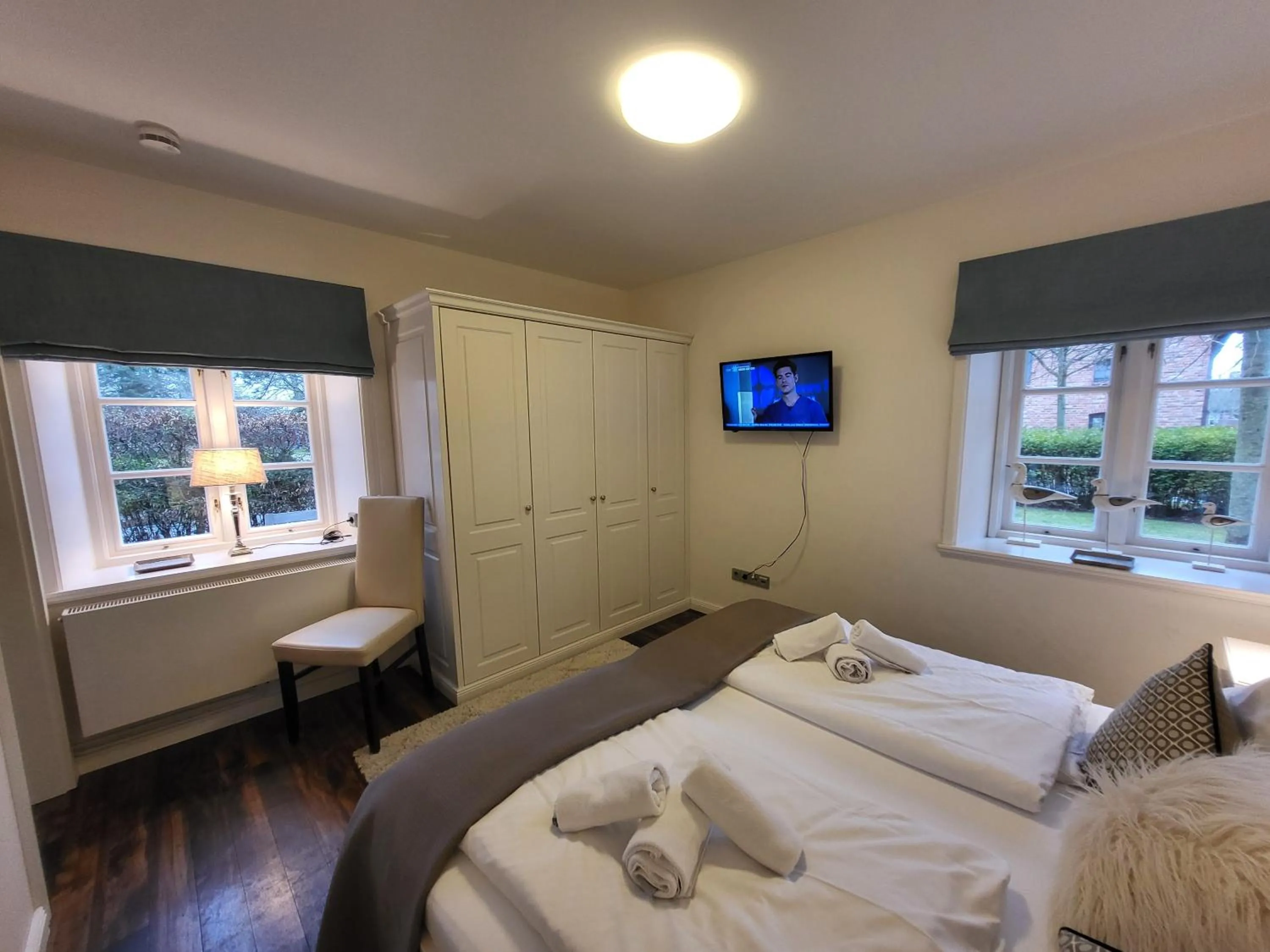 Bed in Ferienwohnung 1 im Reetdachhaus Mühlenhof
