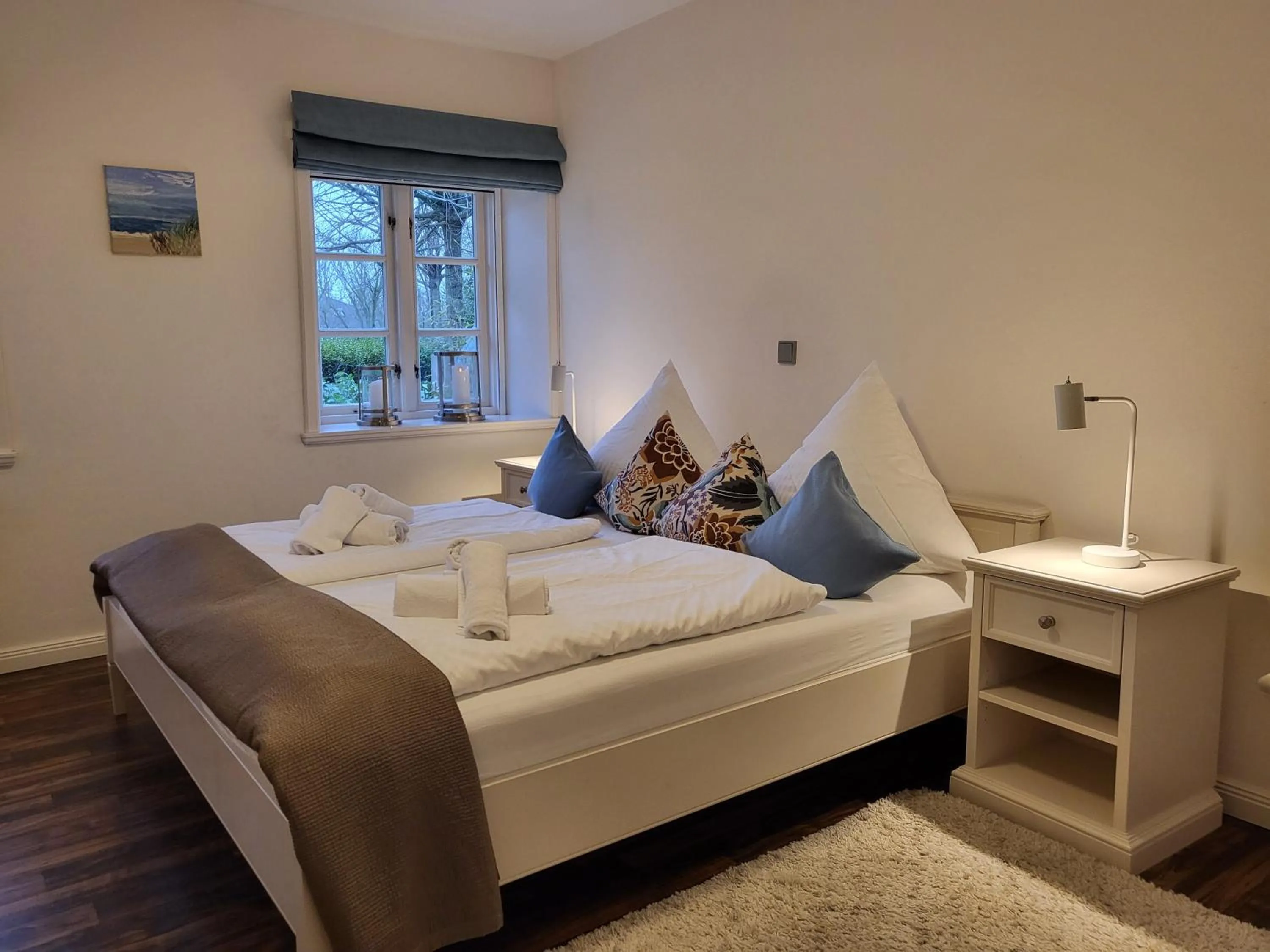Bed in Ferienwohnung 1 im Reetdachhaus Mühlenhof